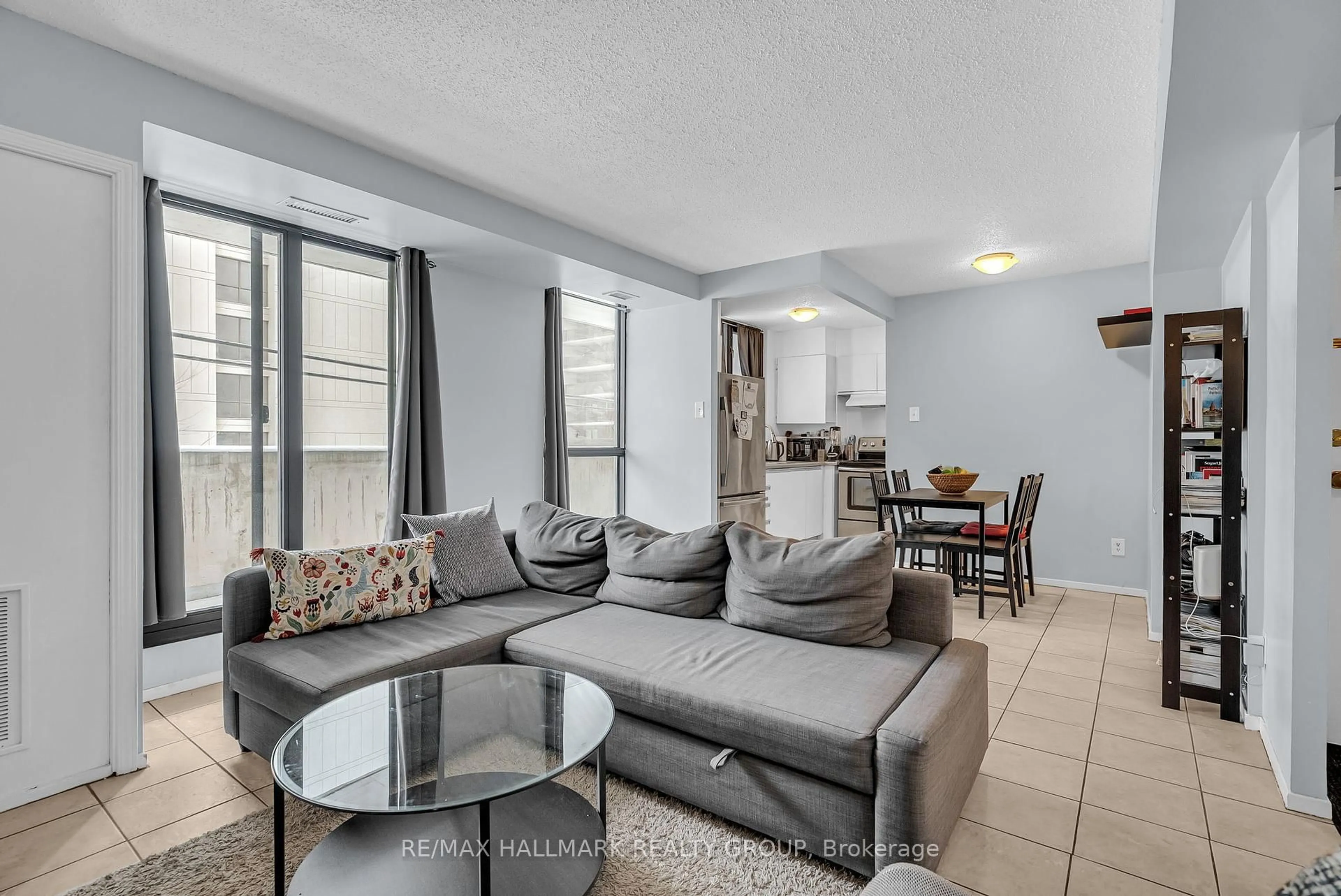 Living room with furniture, unknown for 200 Bay St #202, Ottawa Ontario K1R 7W8