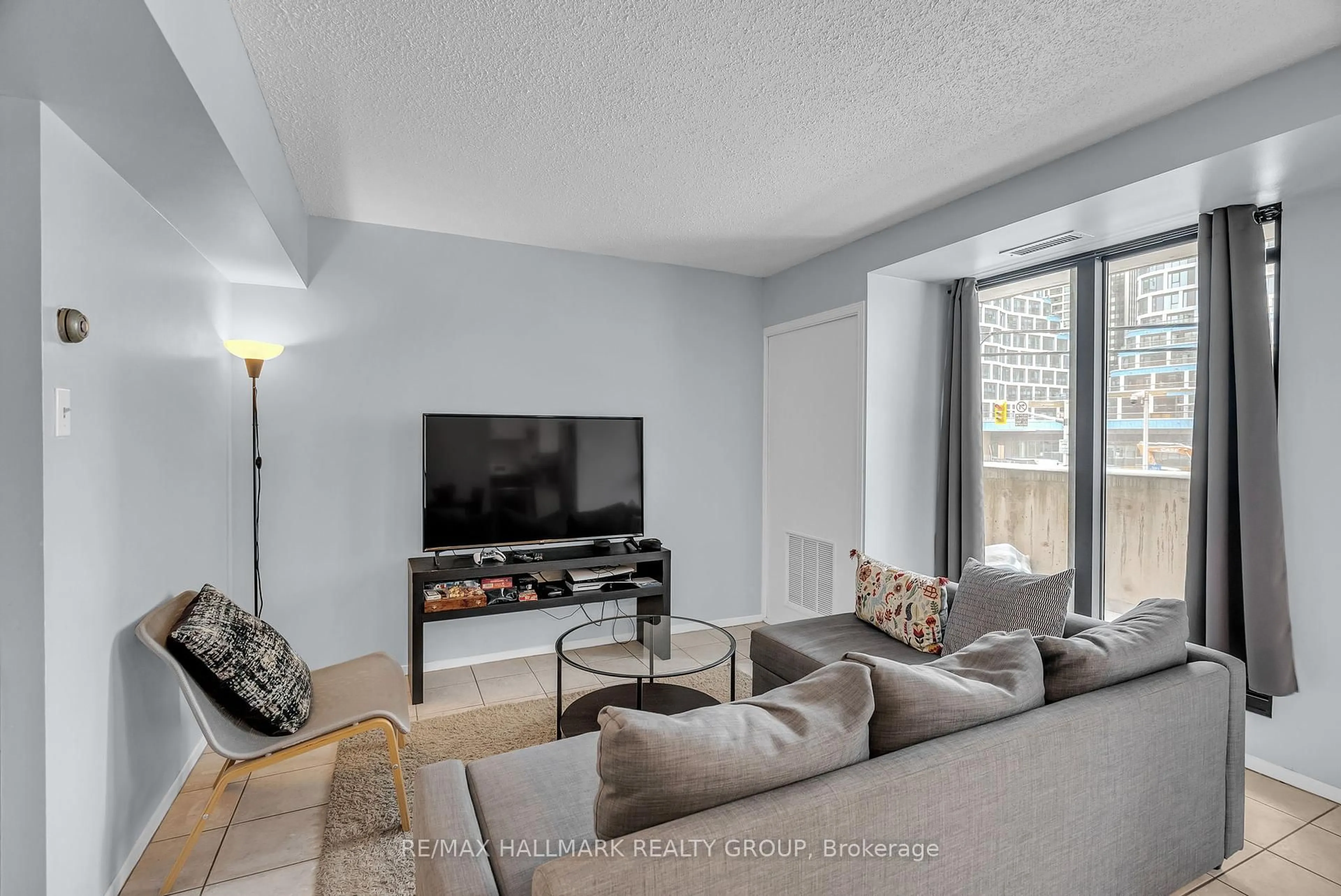 Living room with furniture, unknown for 200 Bay St #202, Ottawa Ontario K1R 7W8