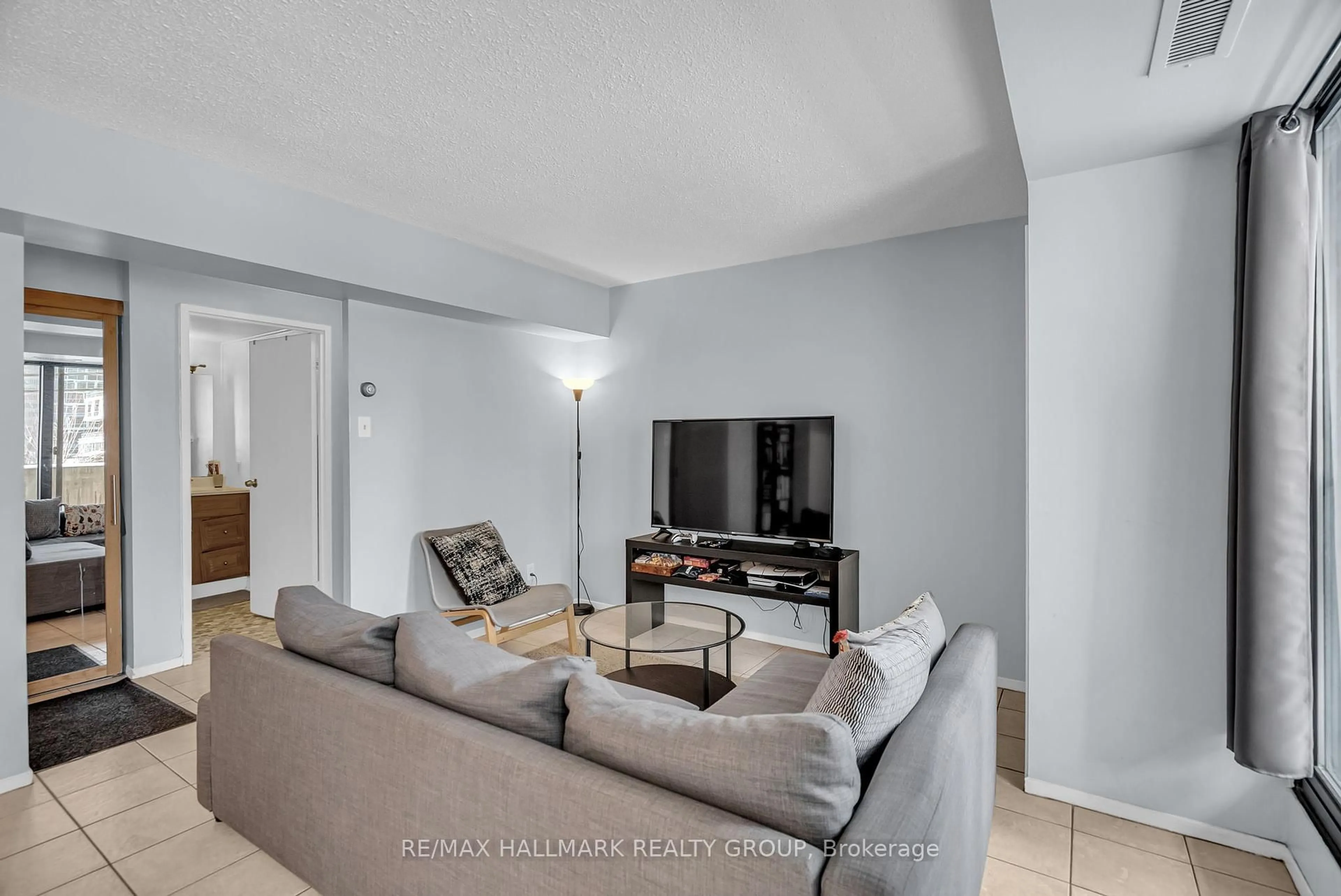 Living room with furniture, unknown for 200 Bay St #202, Ottawa Ontario K1R 7W8