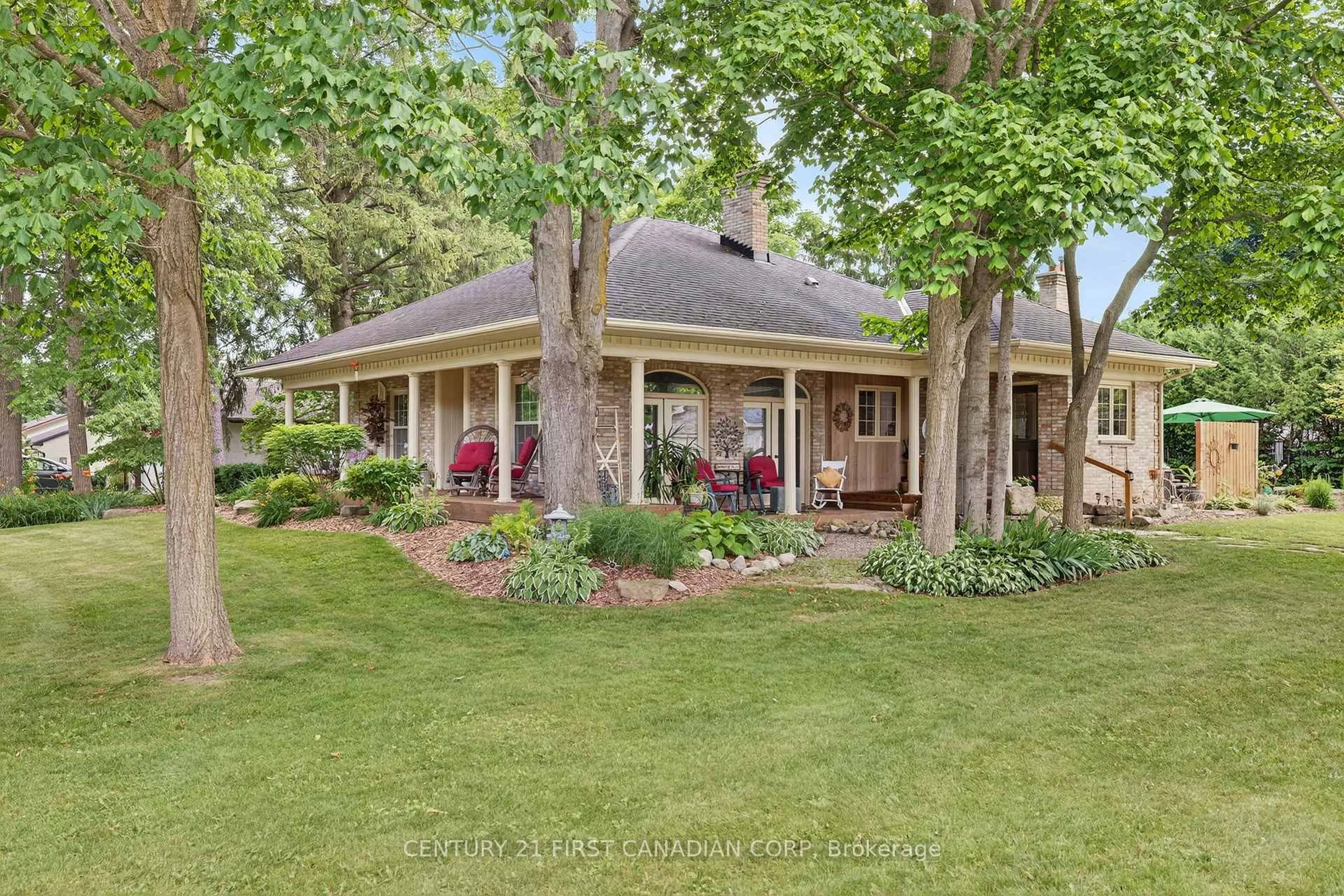 Home with brick exterior material, street for 24439 Poplar Hill Rd, Middlesex Centre Ontario N0M 2A0