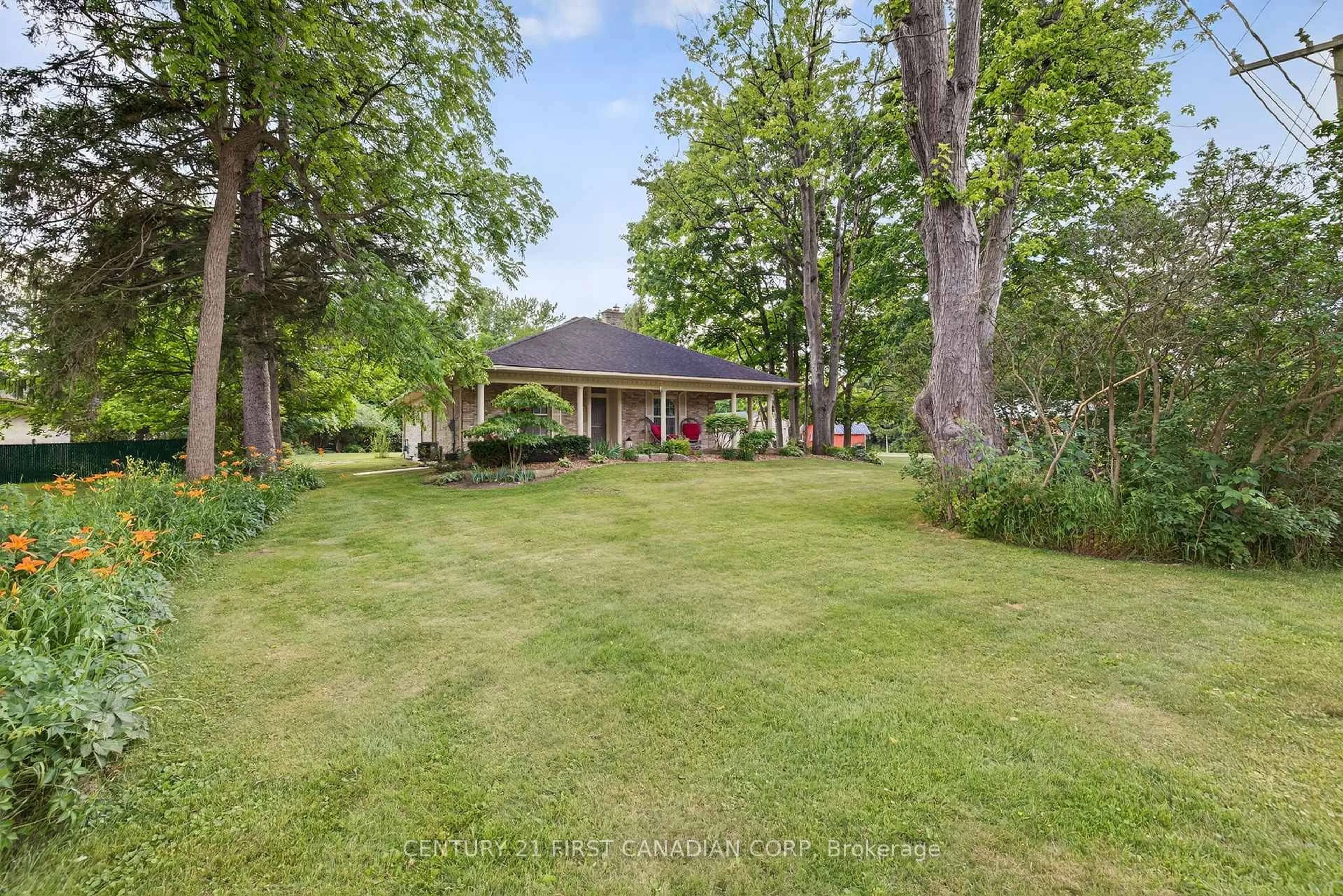 A pic from outside/outdoor area/front of a property/back of a property/a pic from drone, unknown for 24439 Poplar Hill Rd, Middlesex Centre Ontario N0M 2A0