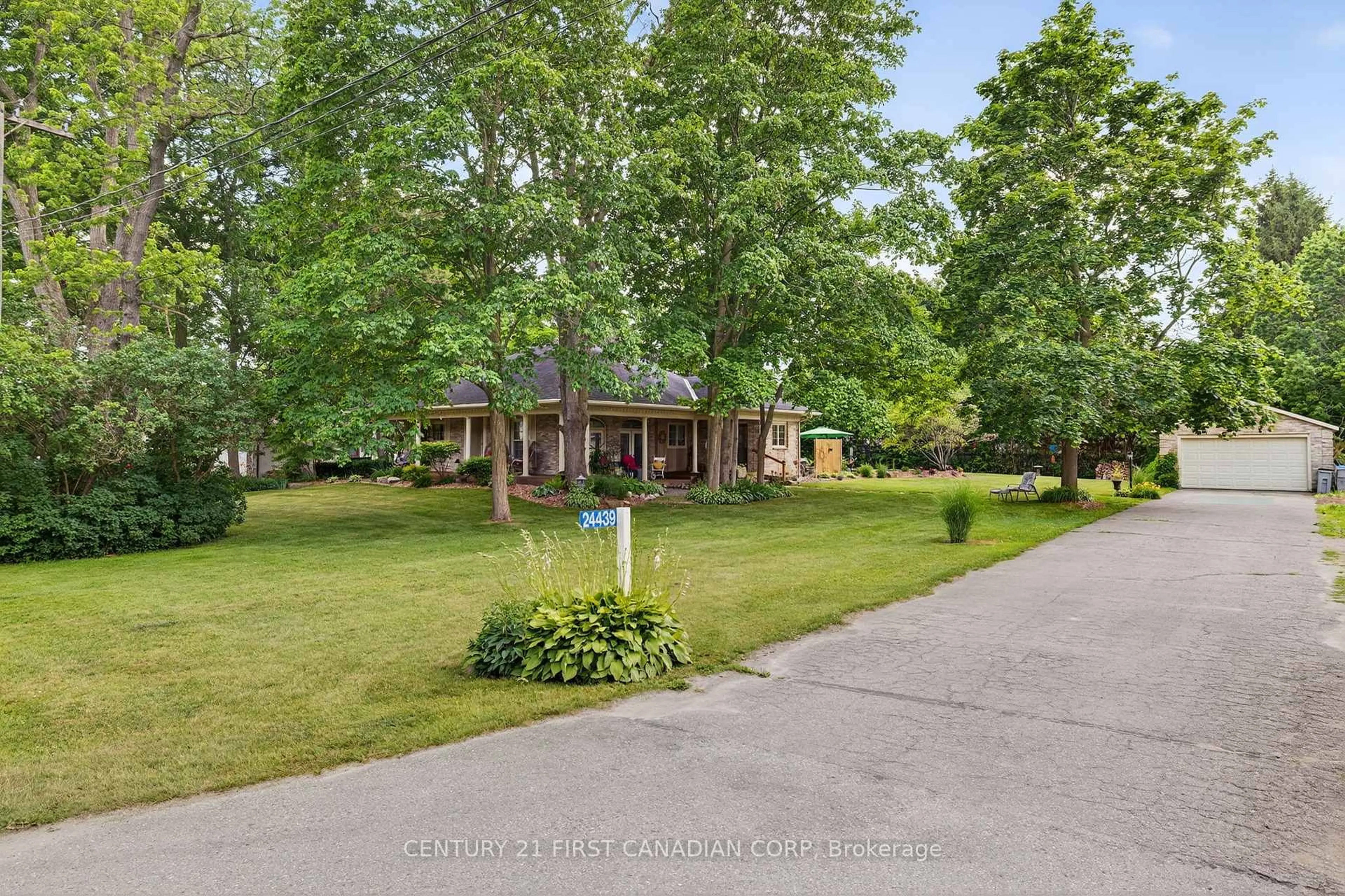 A pic from outside/outdoor area/front of a property/back of a property/a pic from drone, street for 24439 Poplar Hill Rd, Middlesex Centre Ontario N0M 2A0