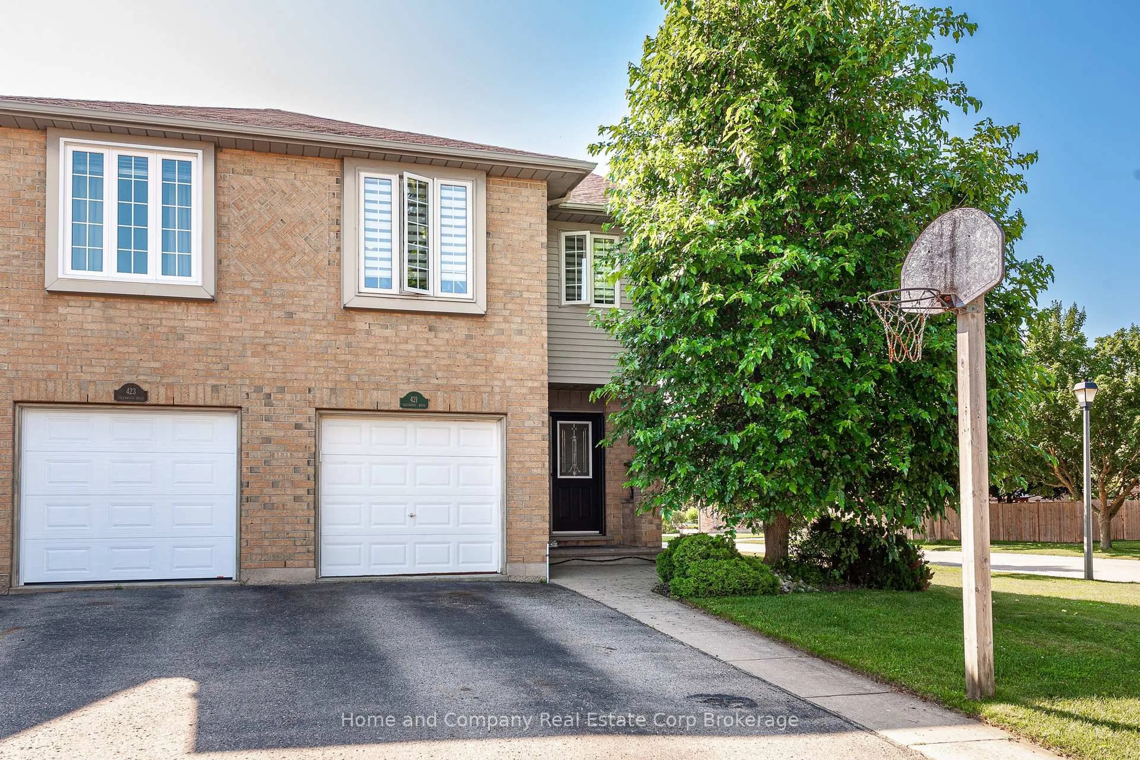 Home with brick exterior material, street for 421 Greenwood Dr, Stratford Ontario N5A 7S7