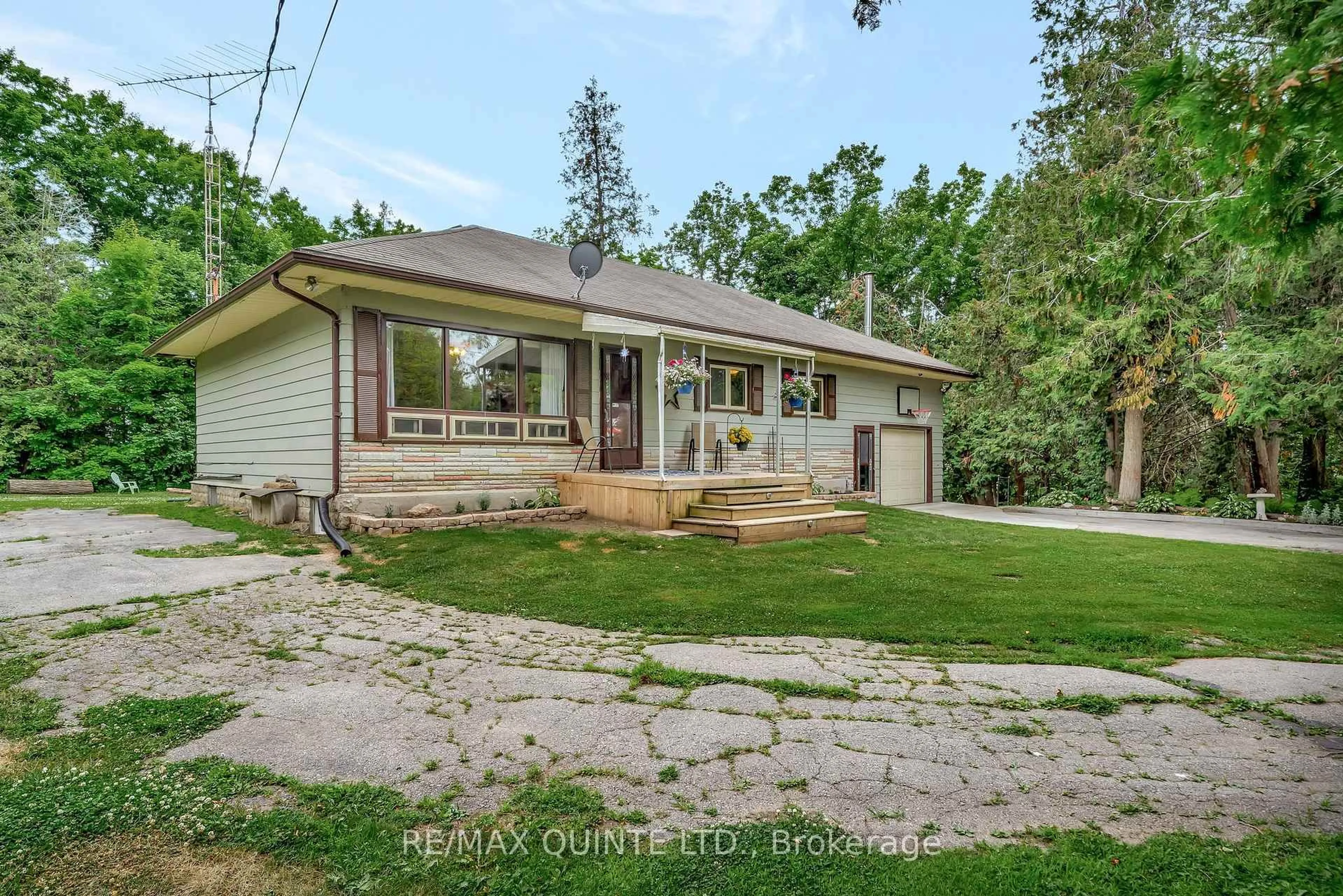 A pic from outside/outdoor area/front of a property/back of a property/a pic from drone, street for 103462 Highway 7 Highway, Limoges Ontario K0K 2M0