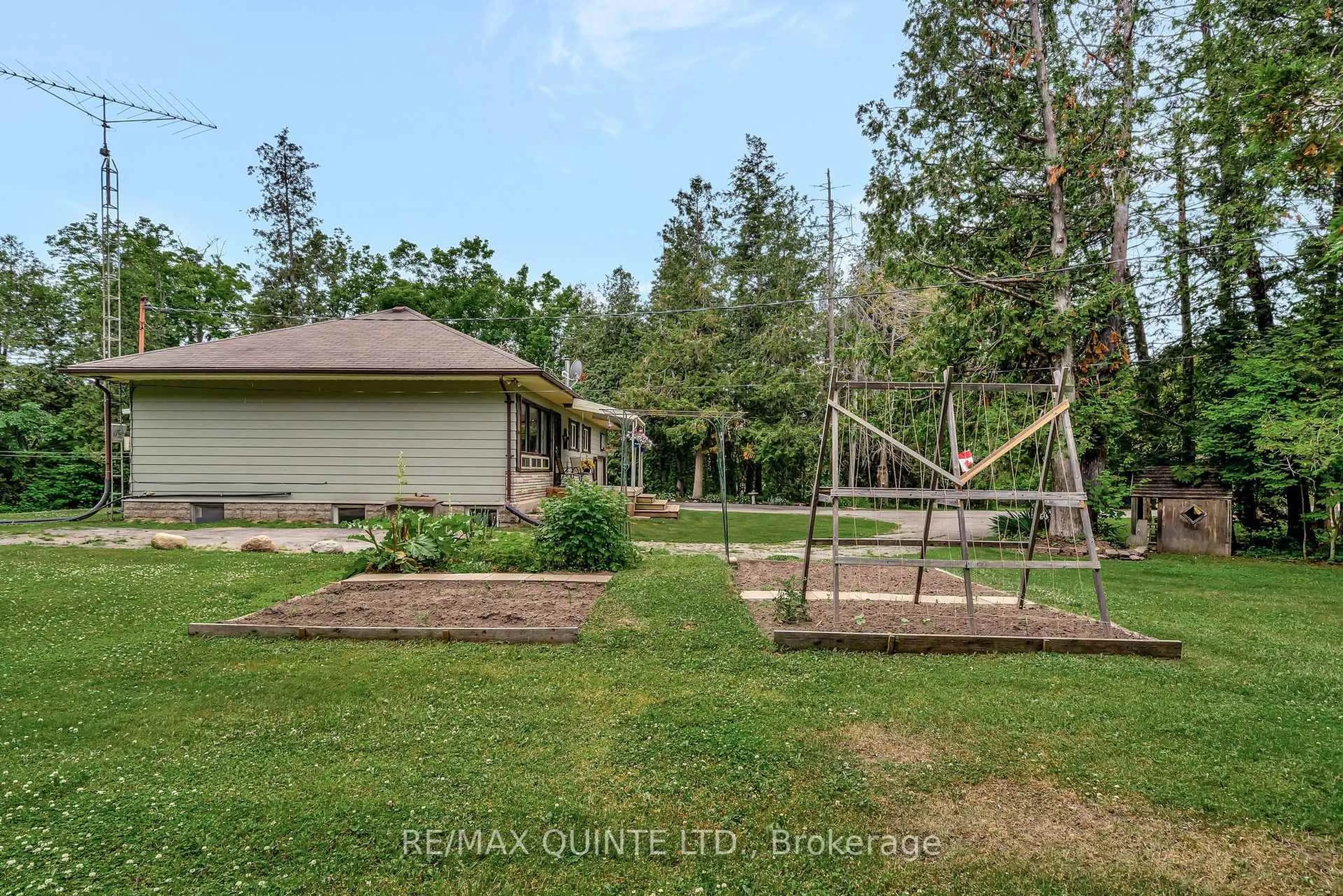 A pic from outside/outdoor area/front of a property/back of a property/a pic from drone, forest/trees view for 103462 Highway 7 Highway, Limoges Ontario K0K 2M0