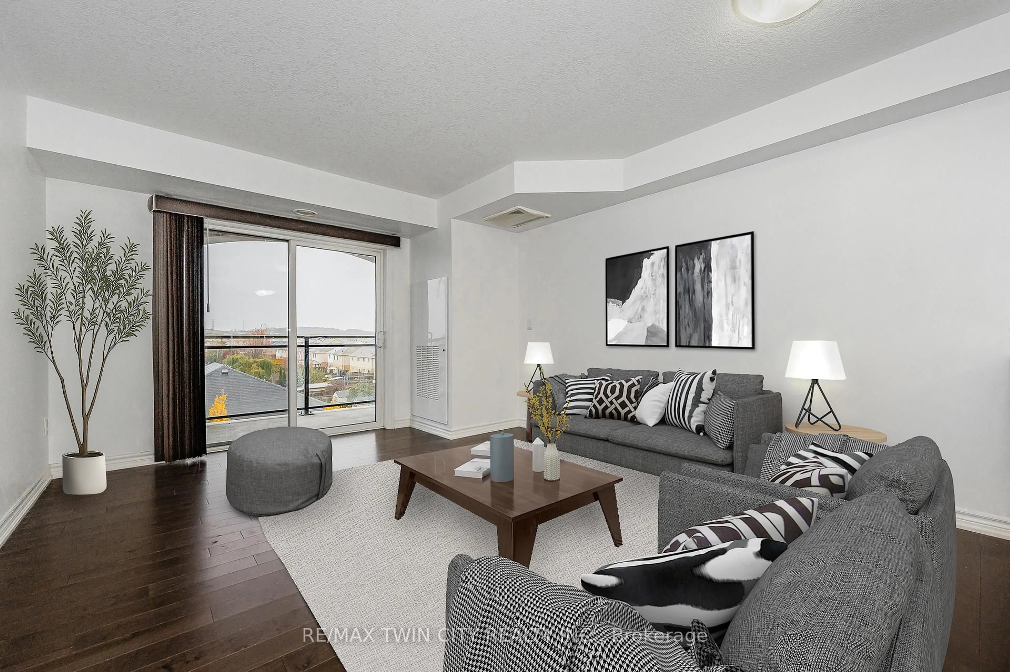 Living room with furniture, wood/laminate floor for 155 Commonwealth St #410, Kitchener Ontario N2E 0G5