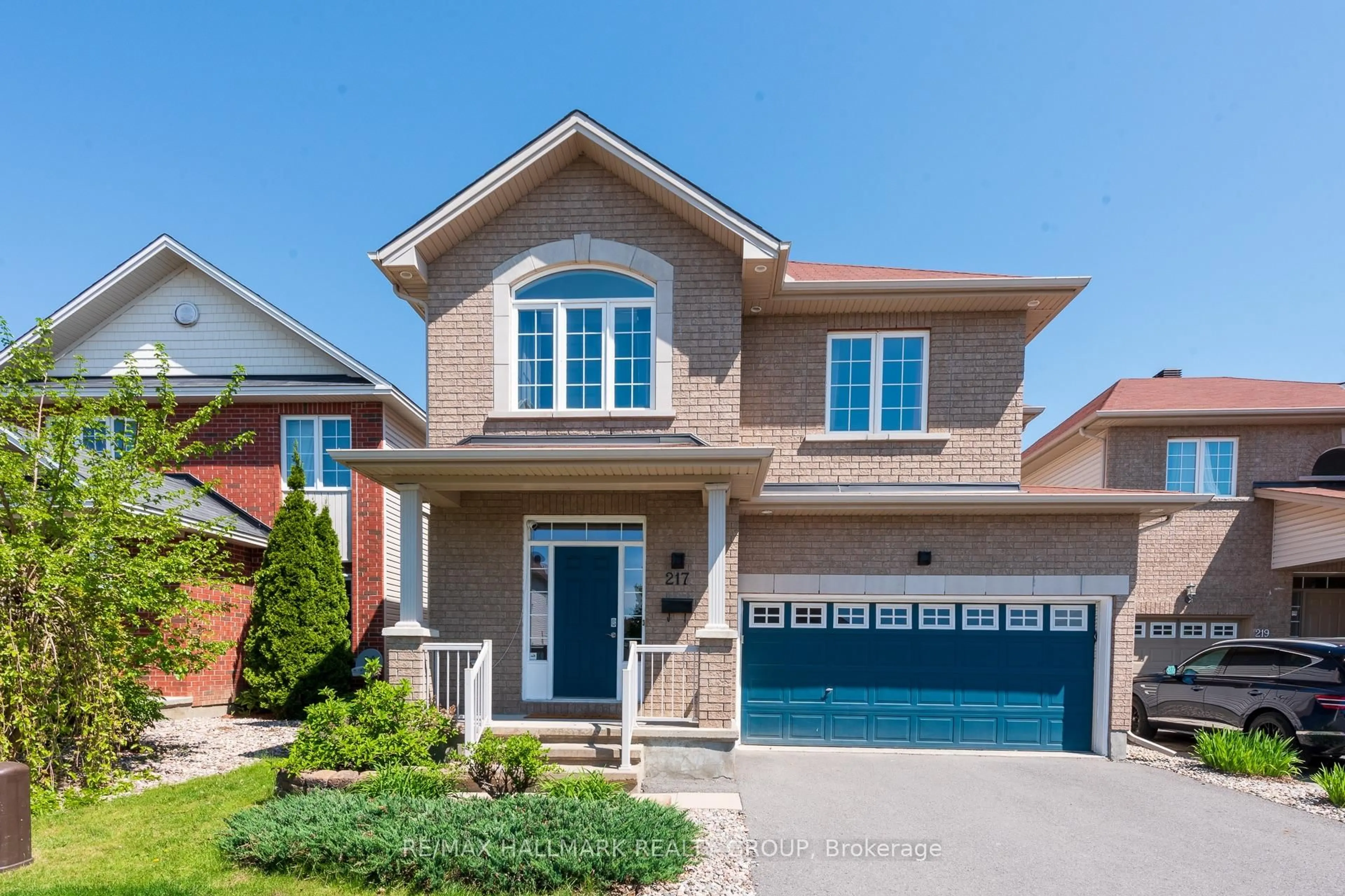 Home with brick exterior material, street for 217 Fountainhead Dr, Ottawa Ontario K1W 0C2