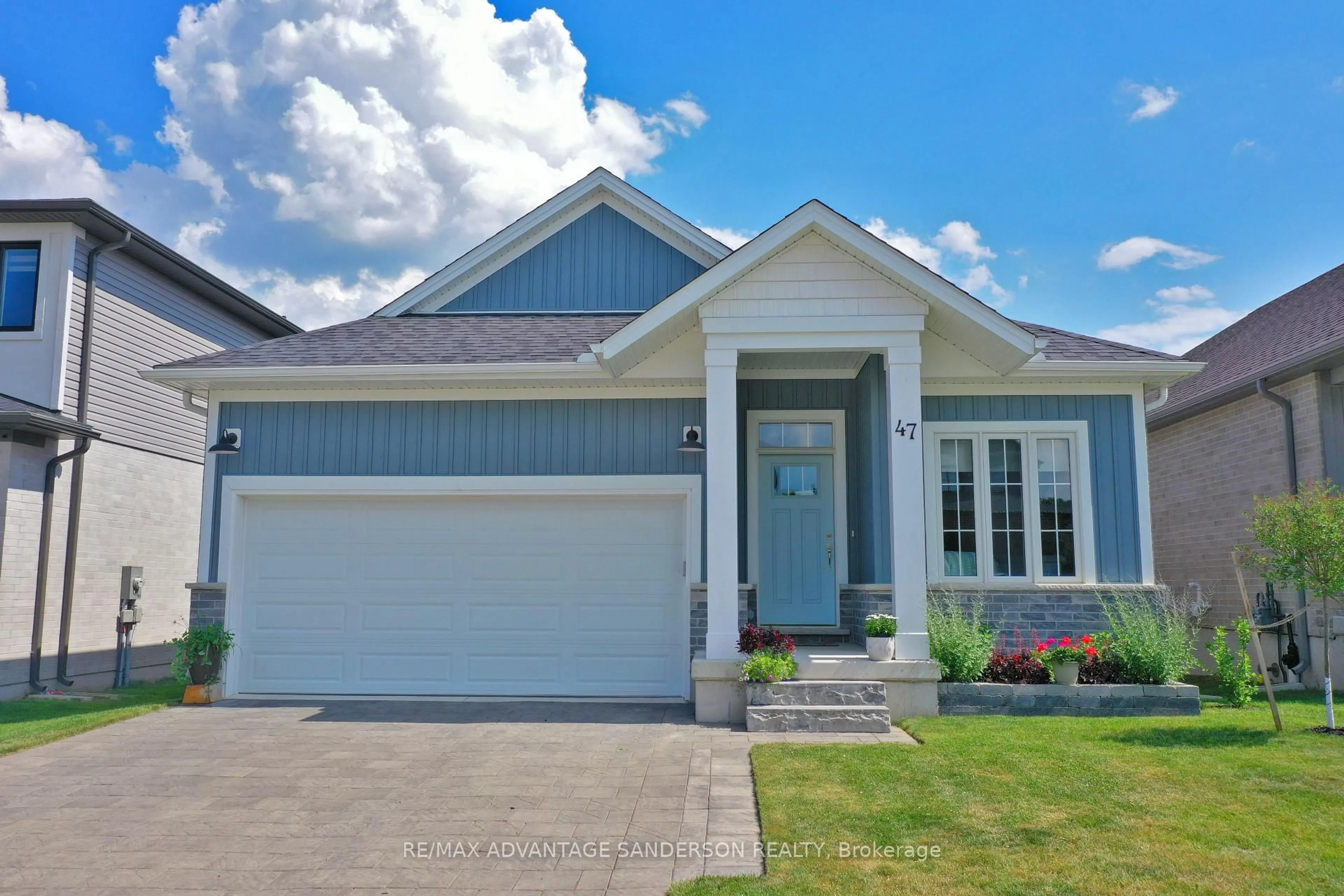 Home with vinyl exterior material, street for 47 Bowman Dr, Middlesex Centre Ontario N0M 2A0