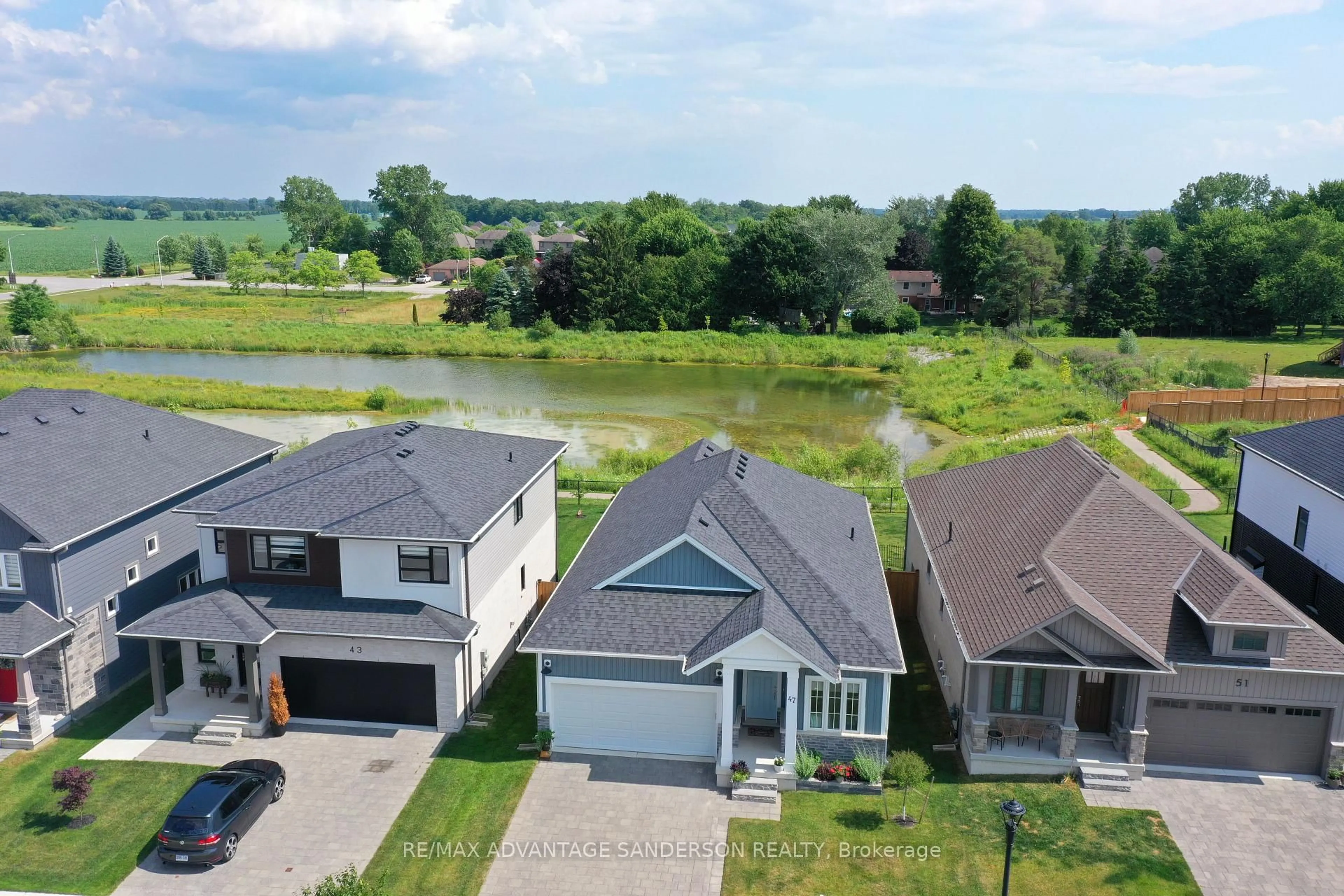 A pic from outside/outdoor area/front of a property/back of a property/a pic from drone, water/lake/river/ocean view for 47 Bowman Dr, Middlesex Centre Ontario N0M 2A0
