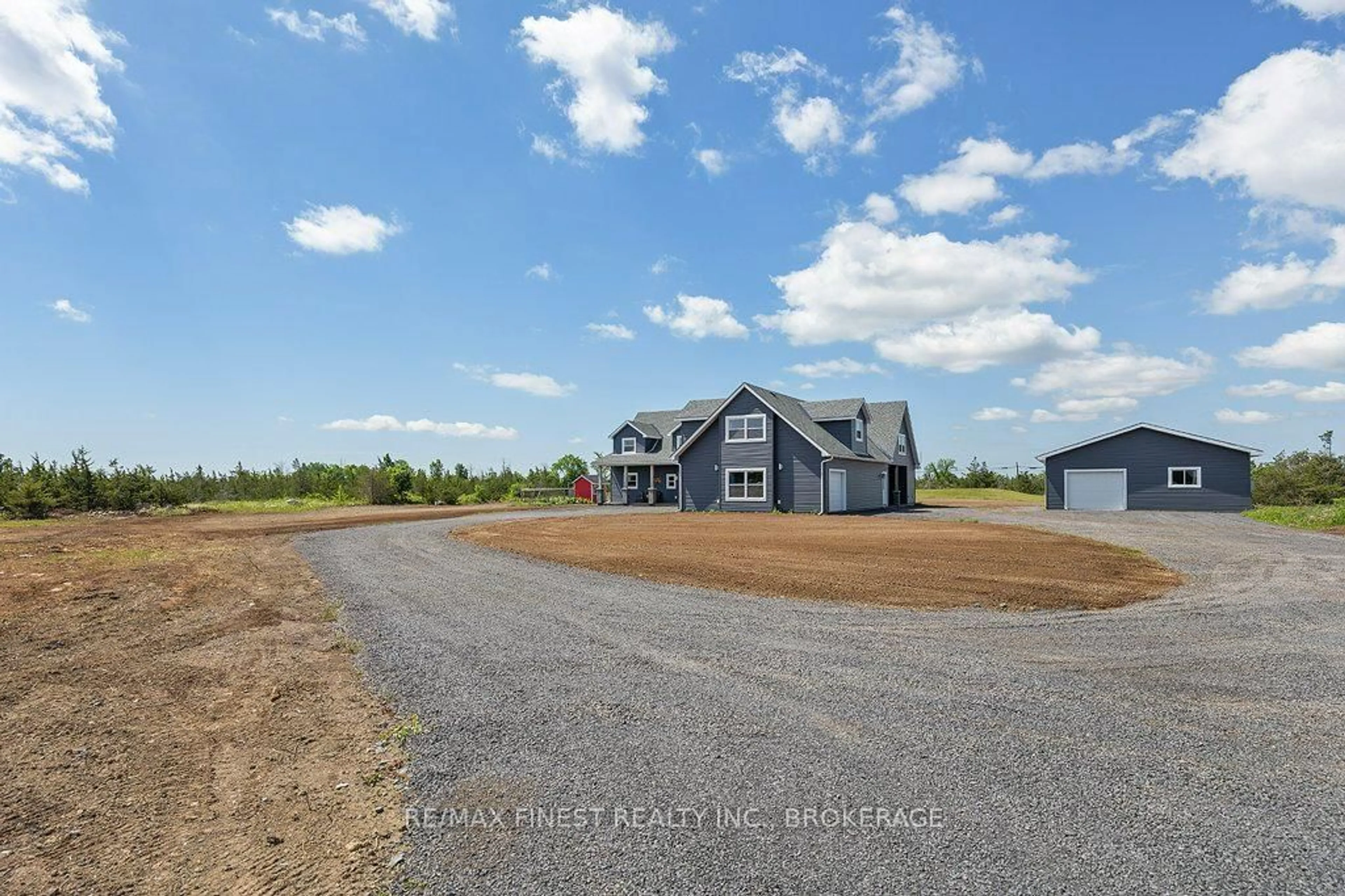 A pic from outside/outdoor area/front of a property/back of a property/a pic from drone, unknown for 952 County Road 6, Bissett Creek Ontario K0H 2H0