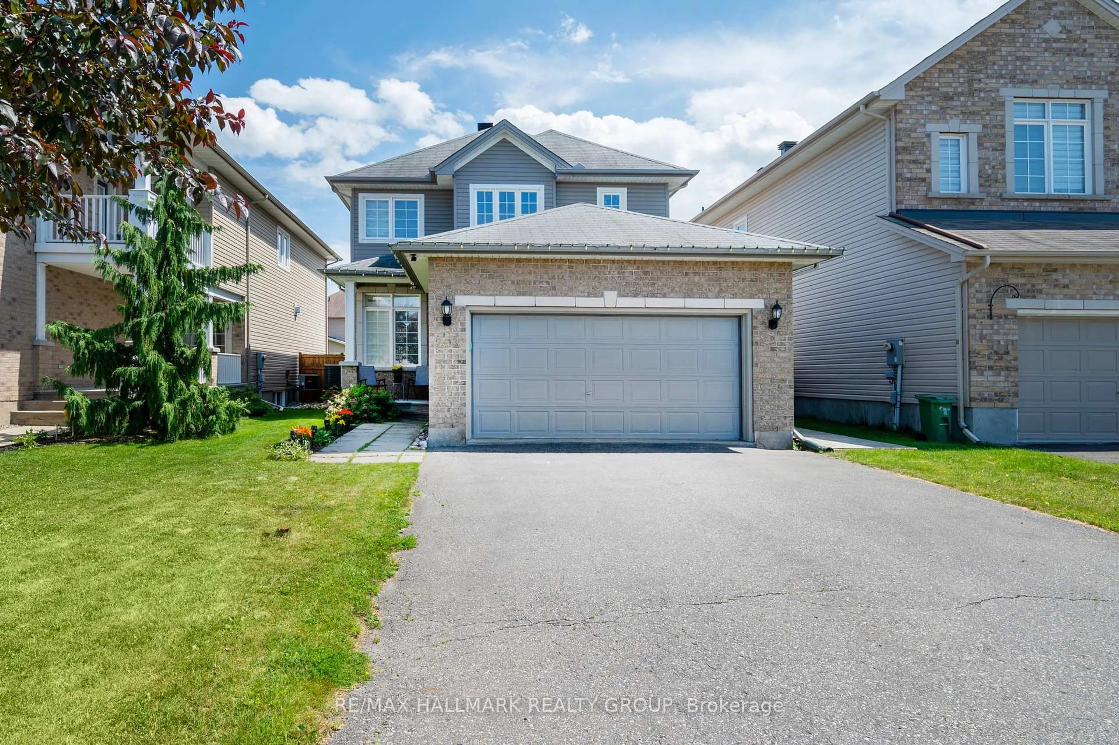 A pic from outside/outdoor area/front of a property/back of a property/a pic from drone, street for 203 BLACK SAGE Cres, Ottawa Ontario K1V 2J7