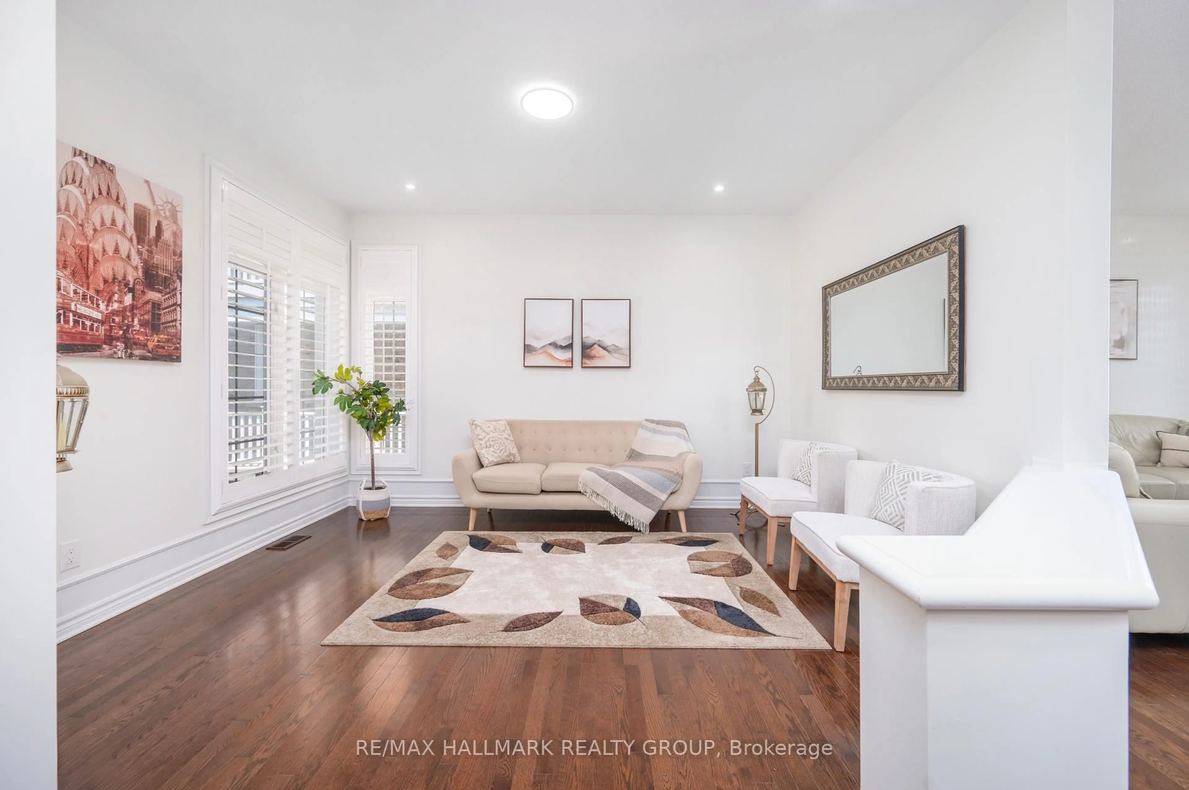 Living room with furniture, wood/laminate floor for 203 BLACK SAGE Cres, Ottawa Ontario K1V 2J7