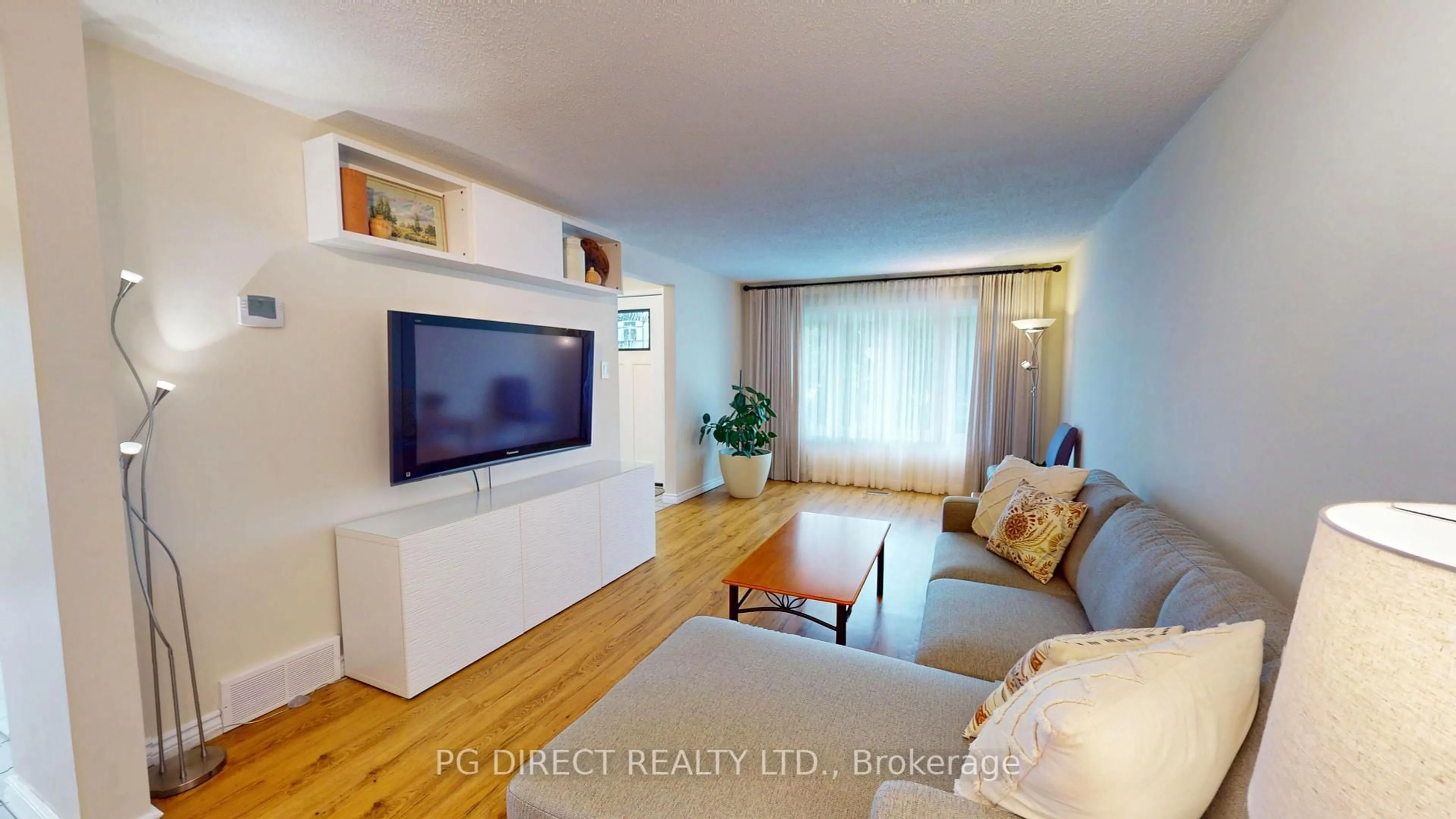 Living room with furniture, wood/laminate floor for 116 Oprington Crt, Kitchener Ontario N2N 3E1