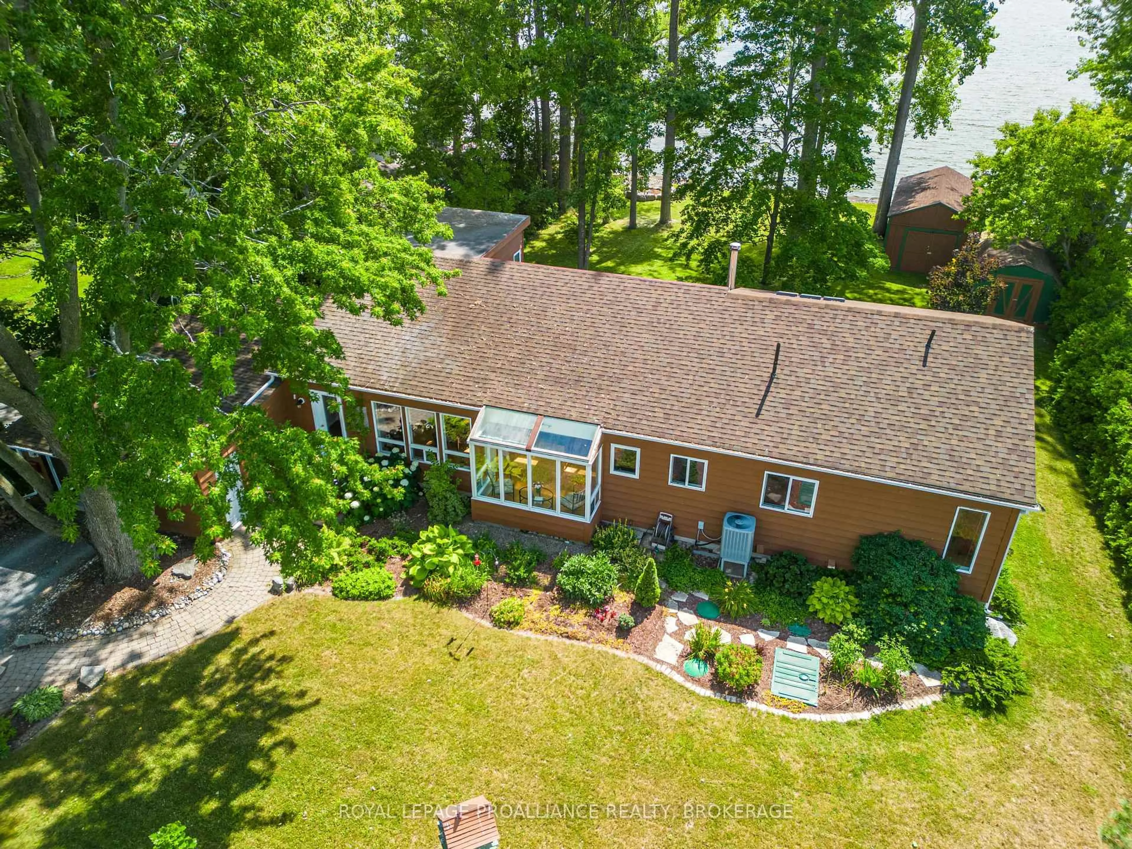 A pic from outside/outdoor area/front of a property/back of a property/a pic from drone, water/lake/river/ocean view for 26 Sunset Lane, Napanee Ontario K7R 3K7