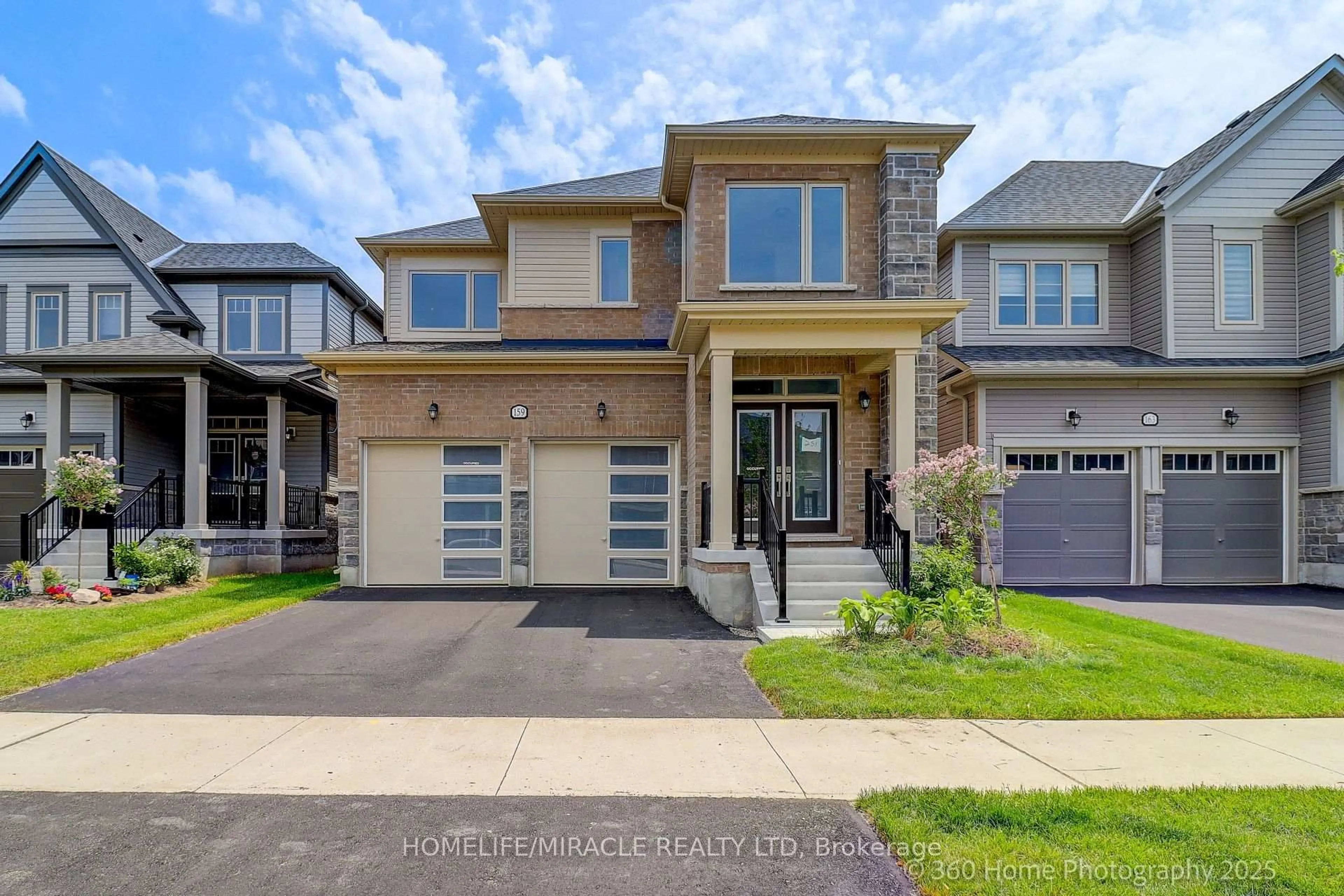 Home with brick exterior material, street for 159 Rea Dr, Centre Wellington Ontario N1M 0J8