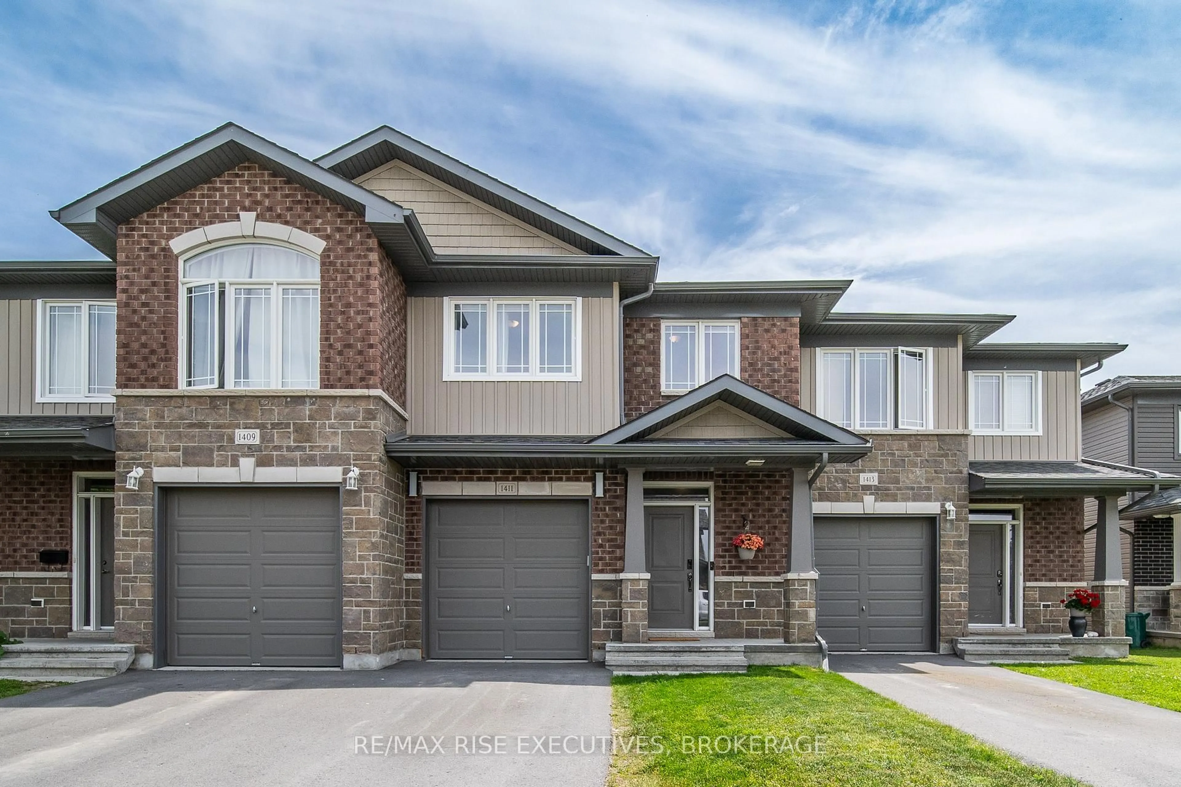 Home with brick exterior material, street for 1411 Monarch Dr, Kingston Ontario K7P 0R9