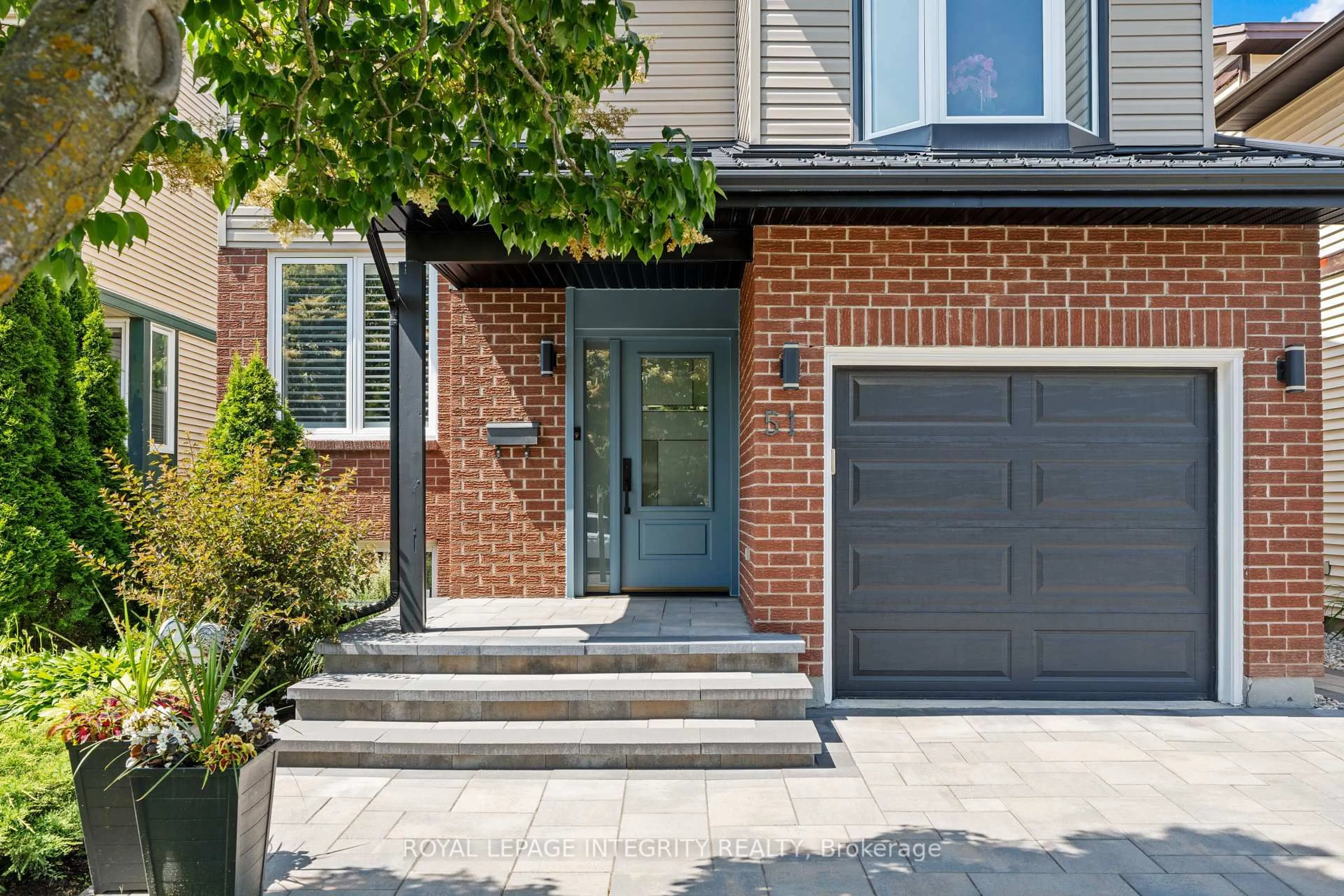 Home with brick exterior material, street for 51 Rosegarden Cres, Ottawa Ontario K1T 3B1