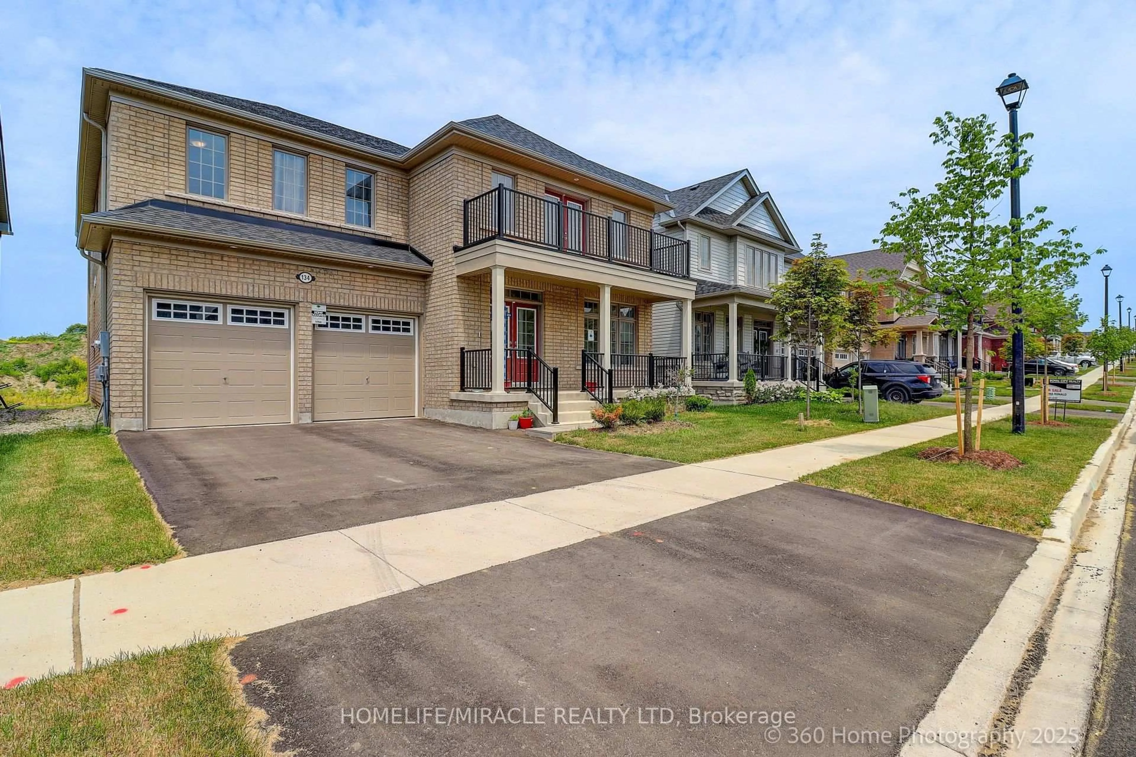 A pic from outside/outdoor area/front of a property/back of a property/a pic from drone, street for 134 REA Dr, Centre Wellington Ontario N1M 0J8