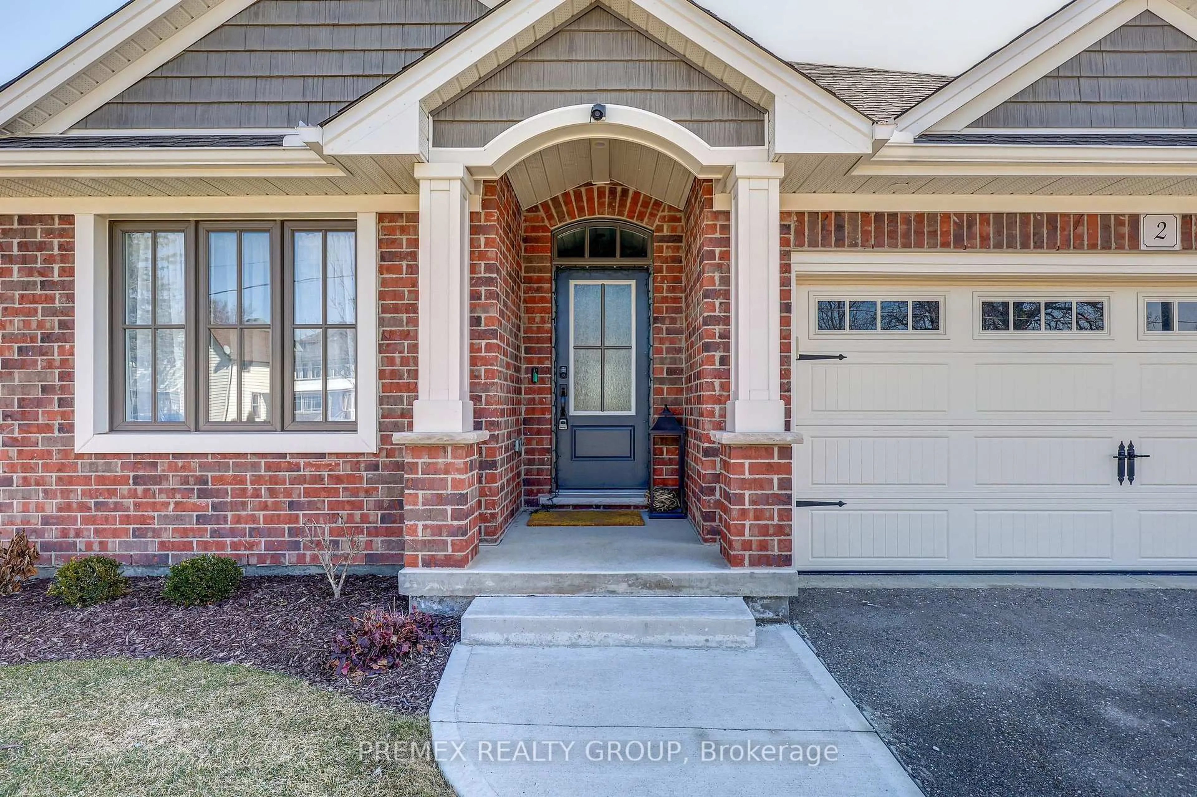 Home with brick exterior material, street for 77 Princess Ave #2, St. Thomas Ontario N5R 0K9