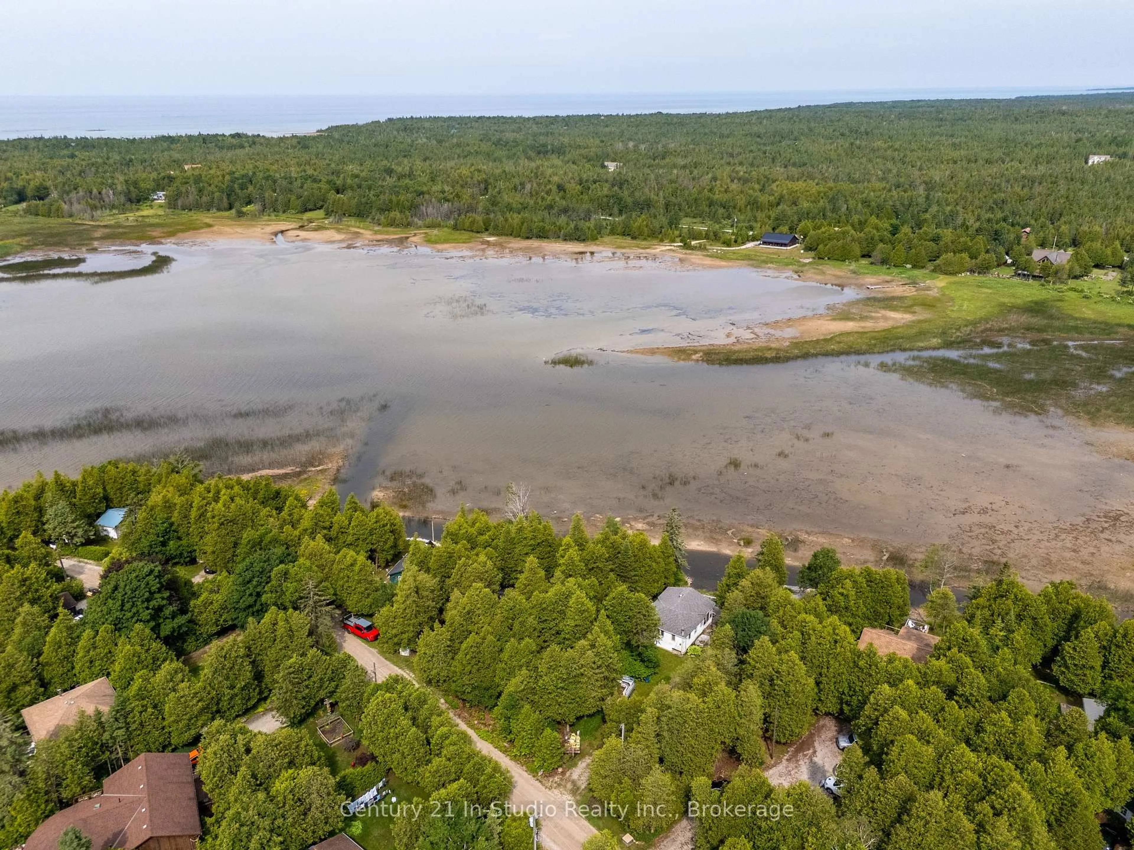 A pic from outside/outdoor area/front of a property/back of a property/a pic from drone, water/lake/river/ocean view for 42 STEWARTS Pt, Northern Bruce Peninsula Ontario N0H 2T0