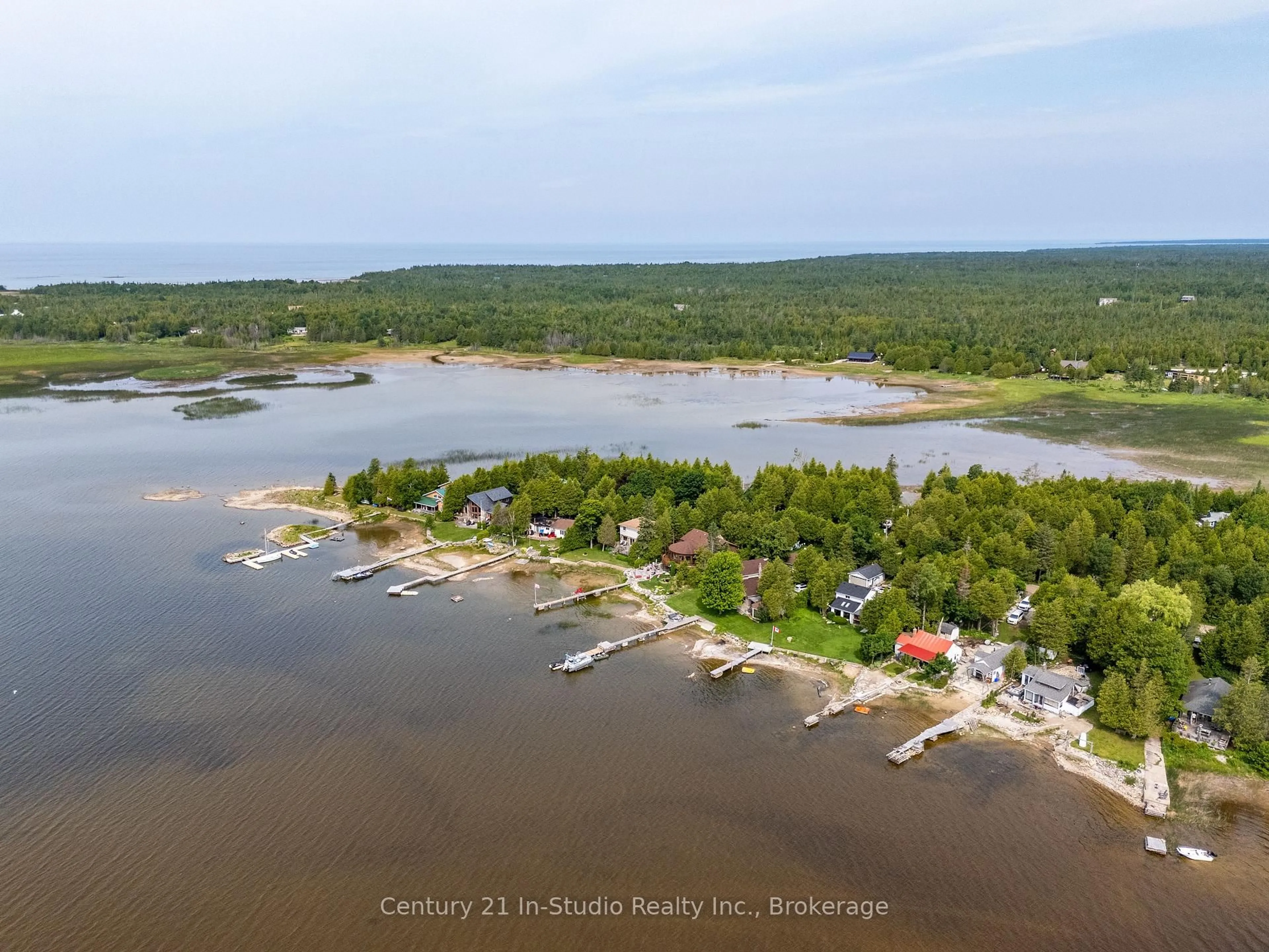 A pic from outside/outdoor area/front of a property/back of a property/a pic from drone, water/lake/river/ocean view for 37 Stewarts Pt, Northern Bruce Peninsula Ontario N0H 2T0