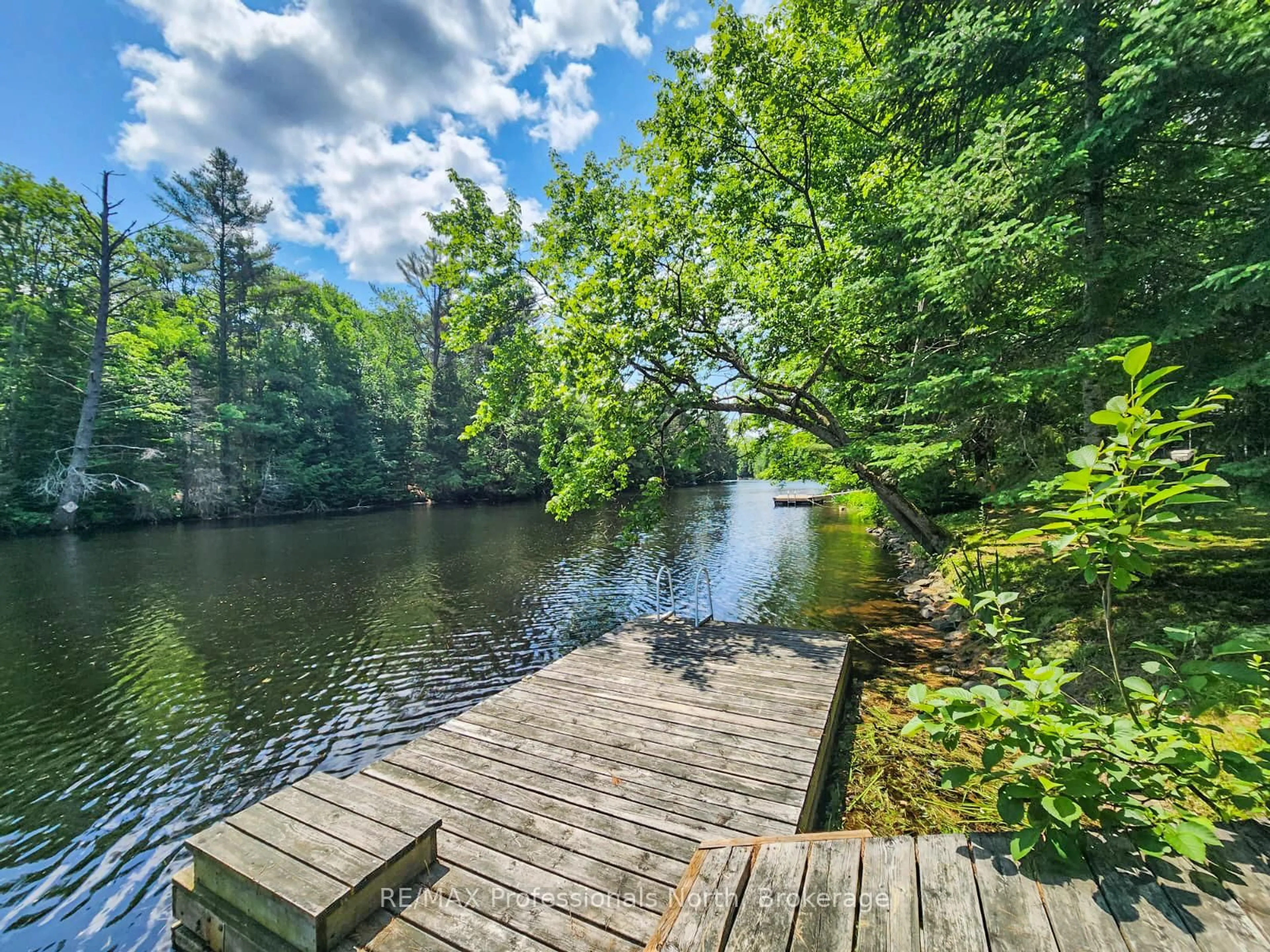 Patio, water/lake/river/ocean view for 1068 Holiday Park Dr, Bracebridge Ontario P1L 1W9