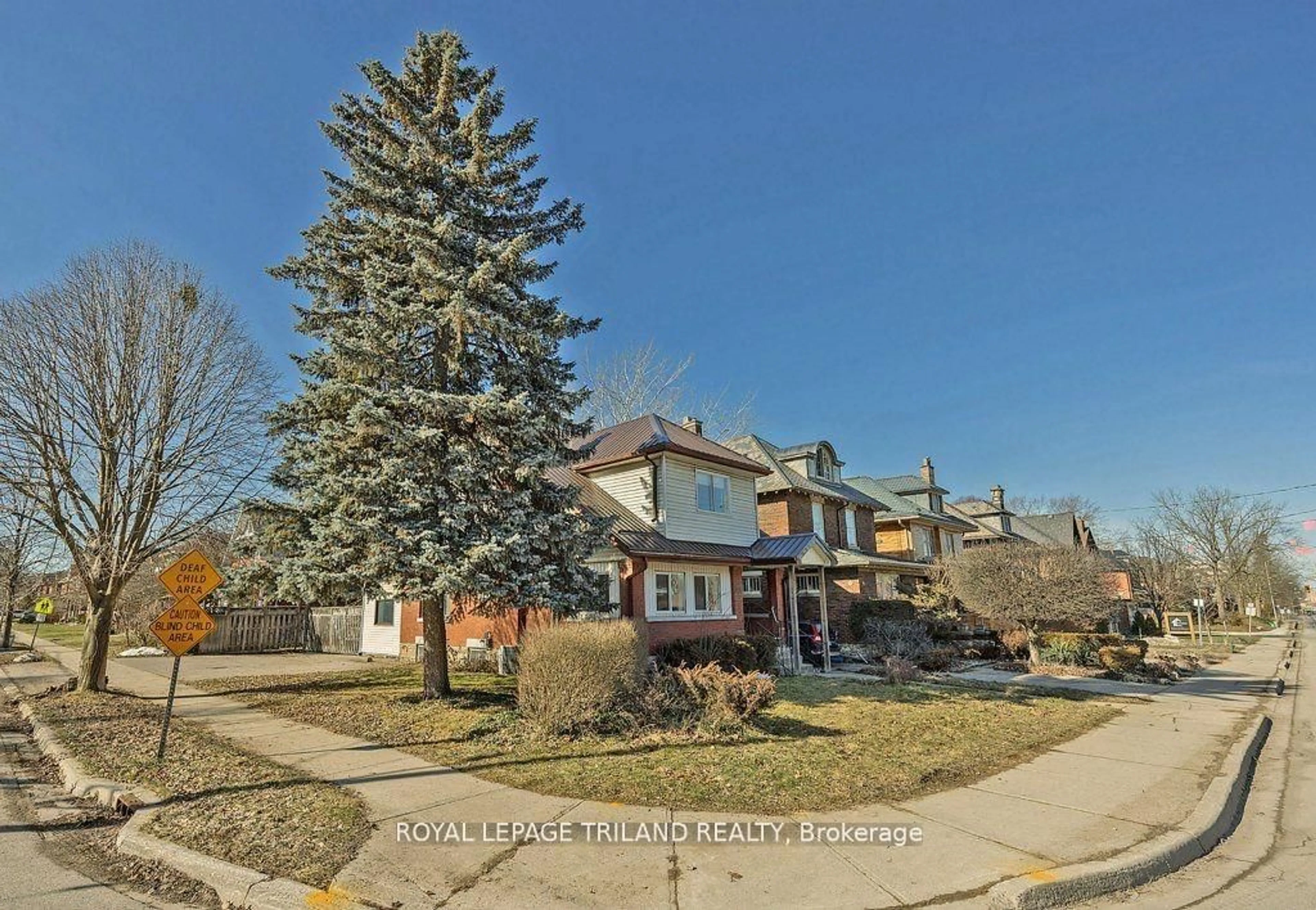 A pic from outside/outdoor area/front of a property/back of a property/a pic from drone, street for 241 Ridout St, London South Ontario N6C 3Y3