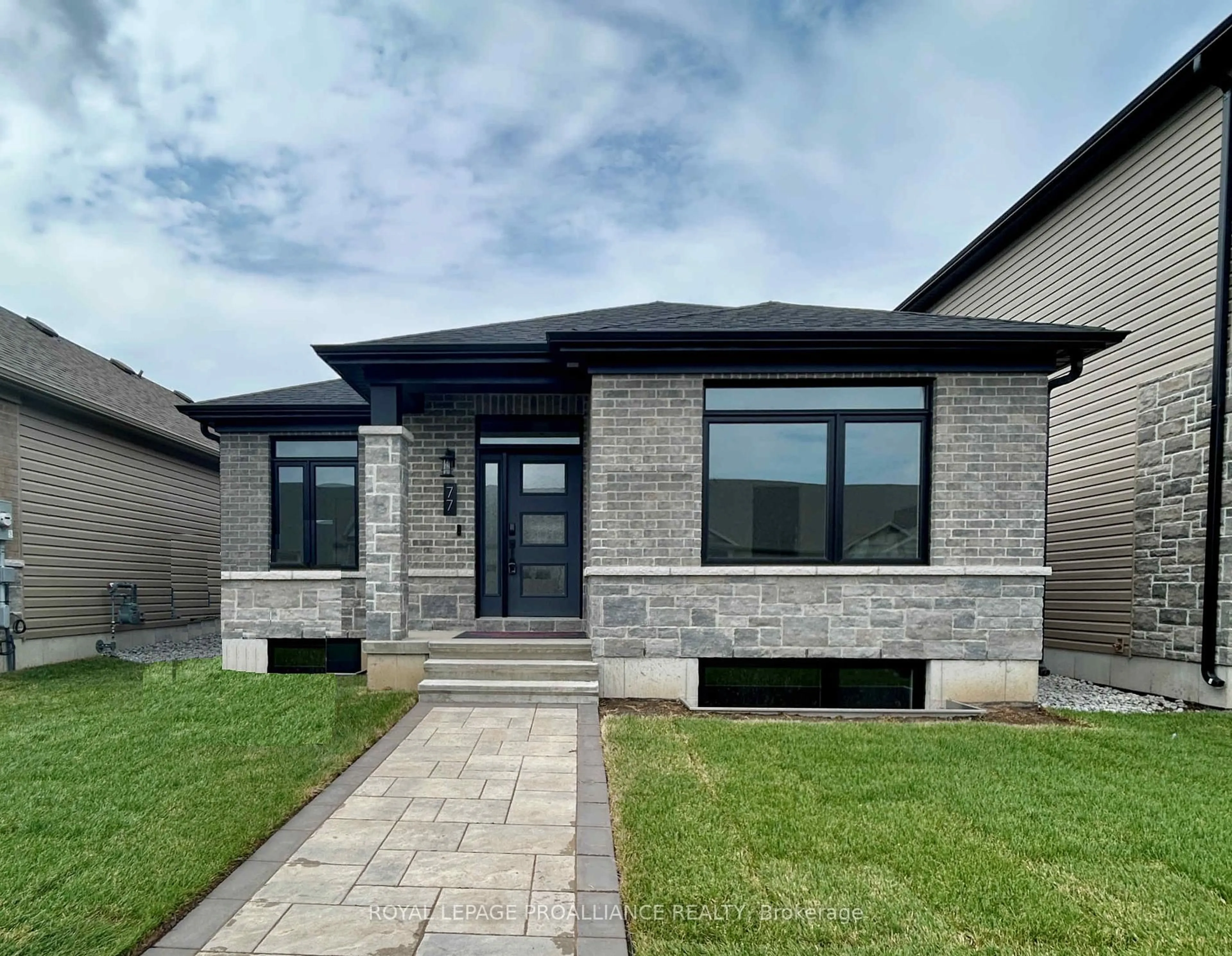 Home with brick exterior material, street for 77 Athabaska Dr, Belleville Ontario K8N 0T1