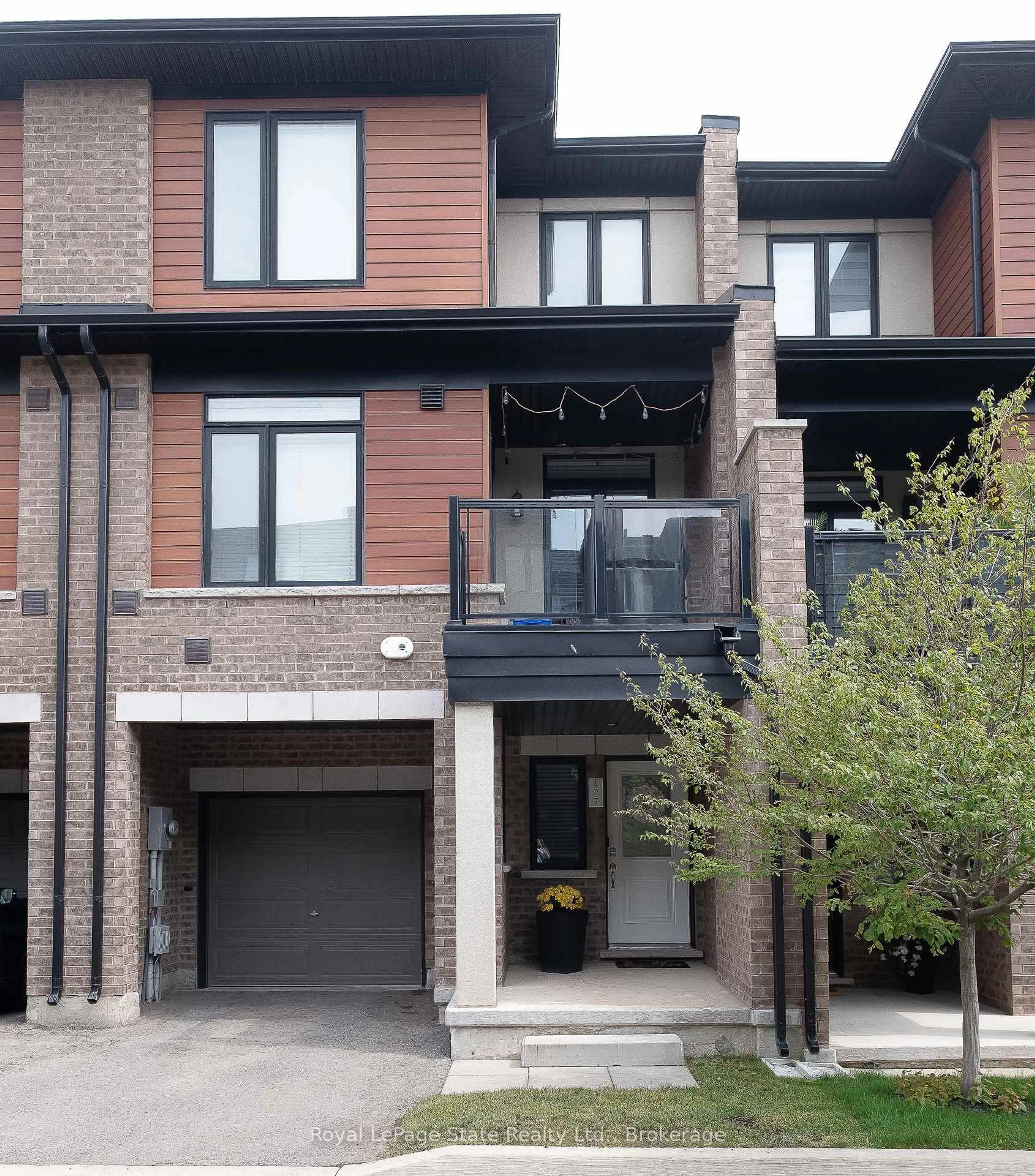 Home with brick exterior material, street for 590 North Service Rd #127, Hamilton Ontario L8E 0K5