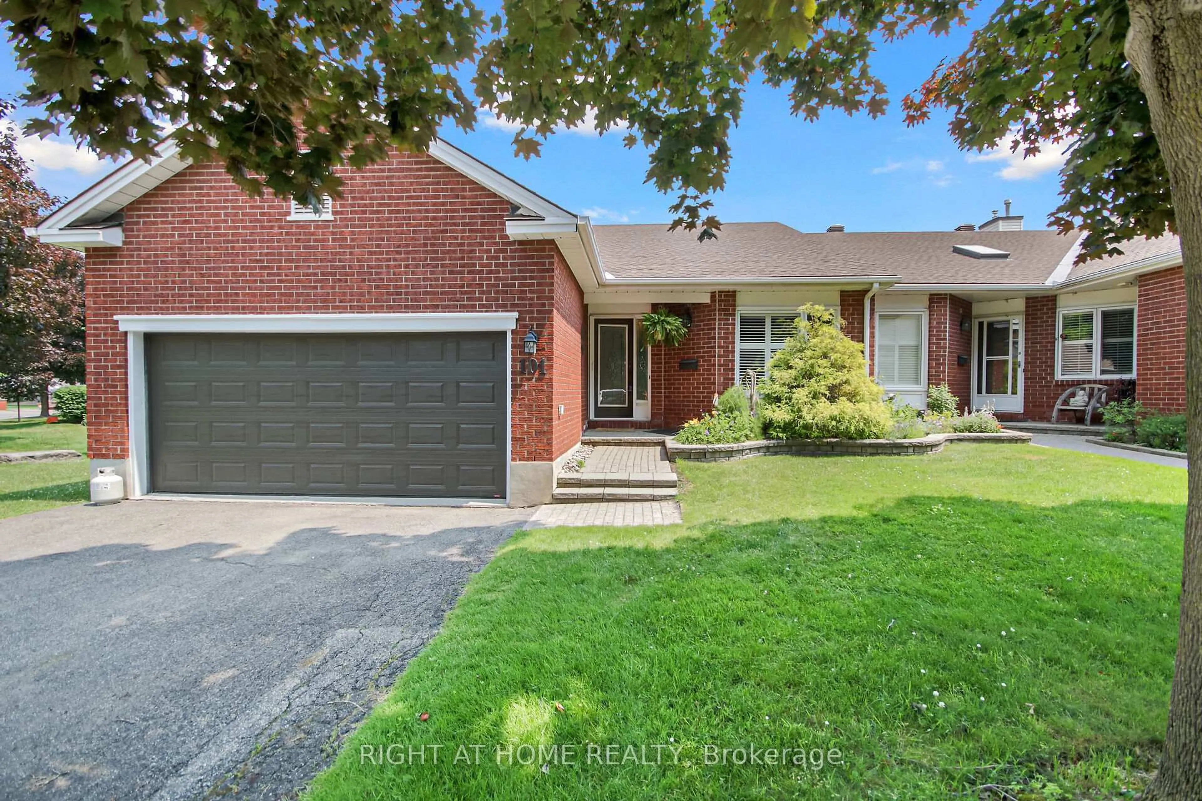 Home with brick exterior material, street for 101 Darlington Private, Ottawa Ontario K1V 0X8