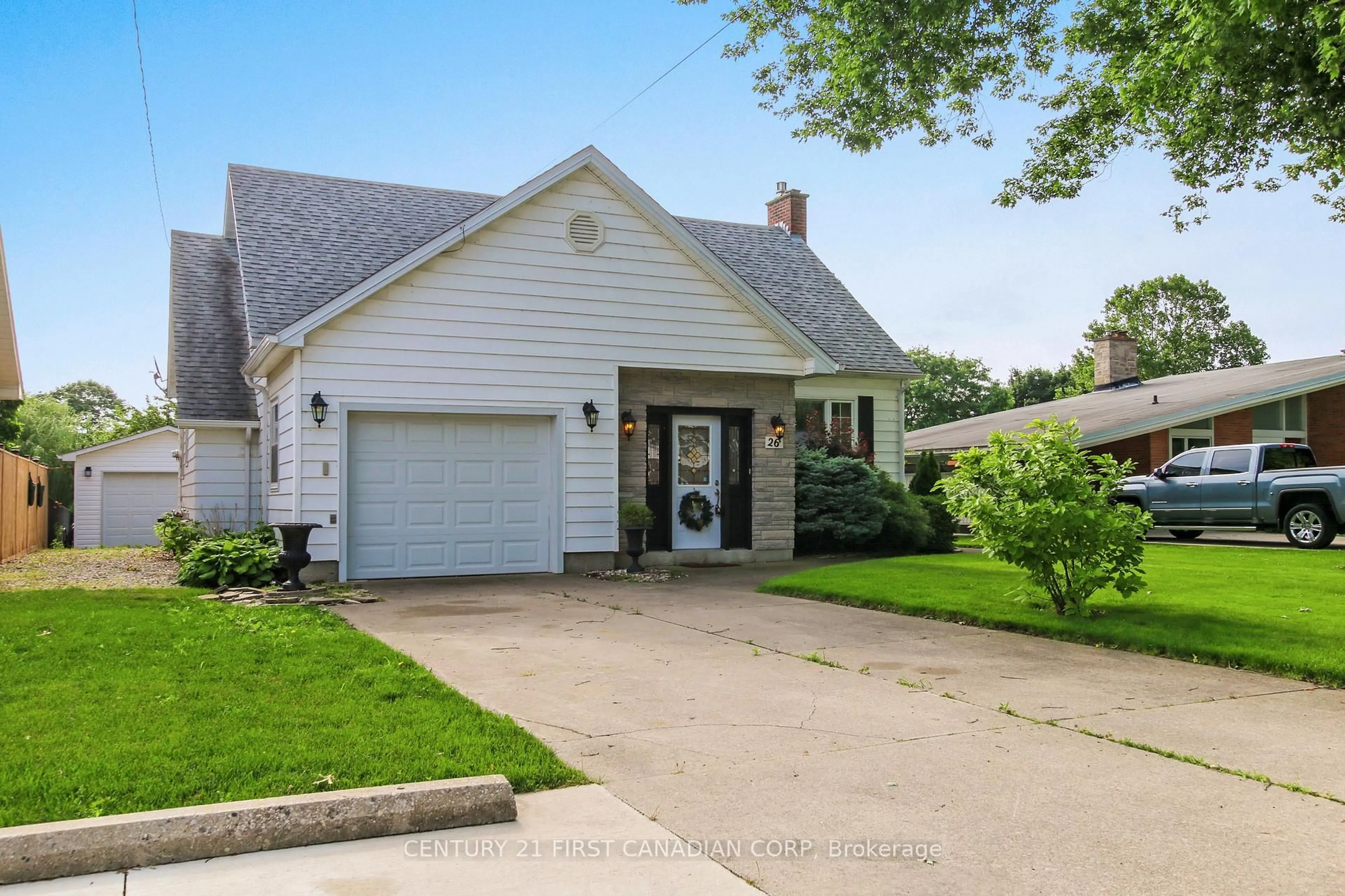 Home with vinyl exterior material, street for 26 Grand Ave, Chatham-Kent Ontario N8A 4J9