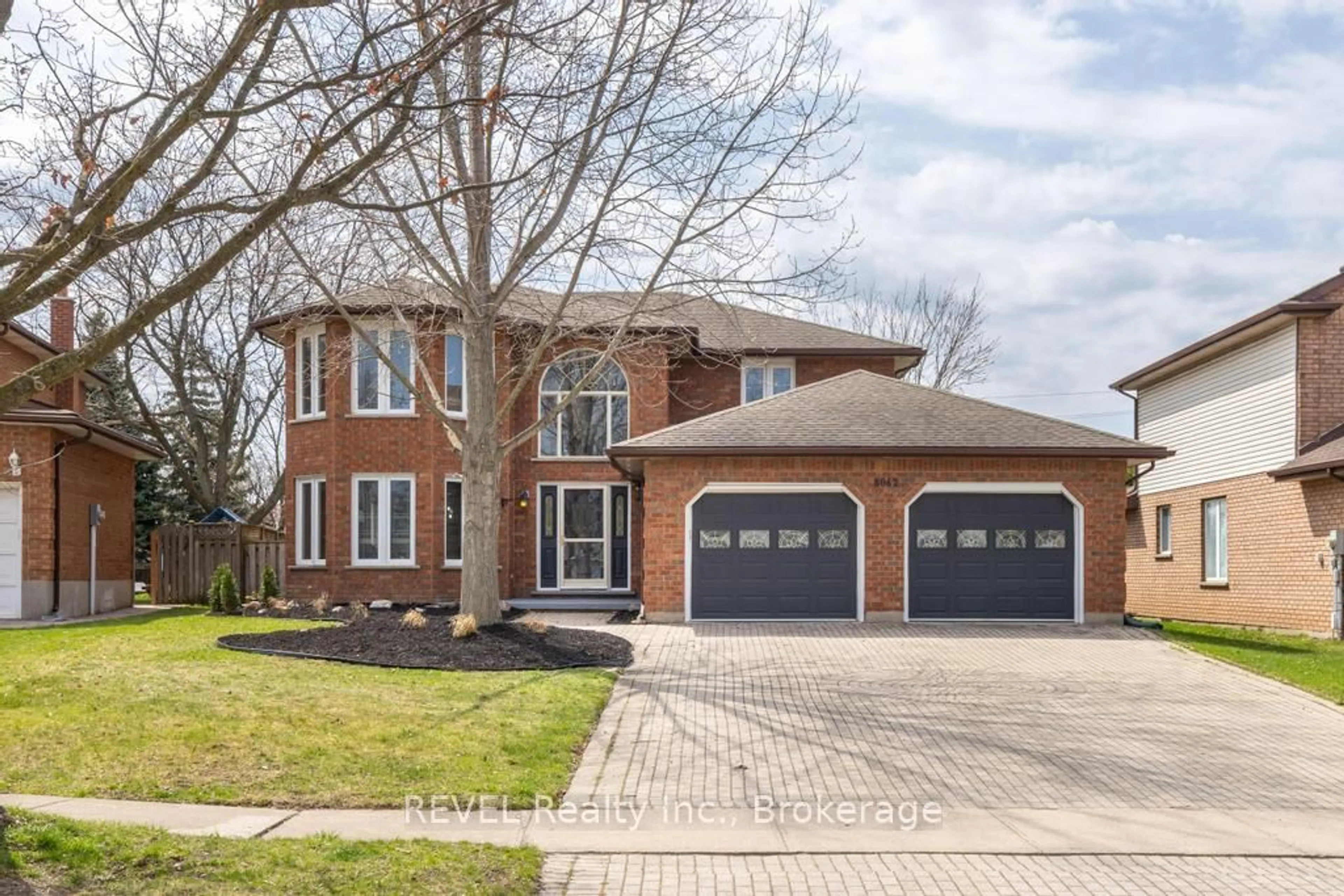Home with brick exterior material, street for 8042 Oakridge Drive Dr, Niagara Falls Ontario L2H 2W1
