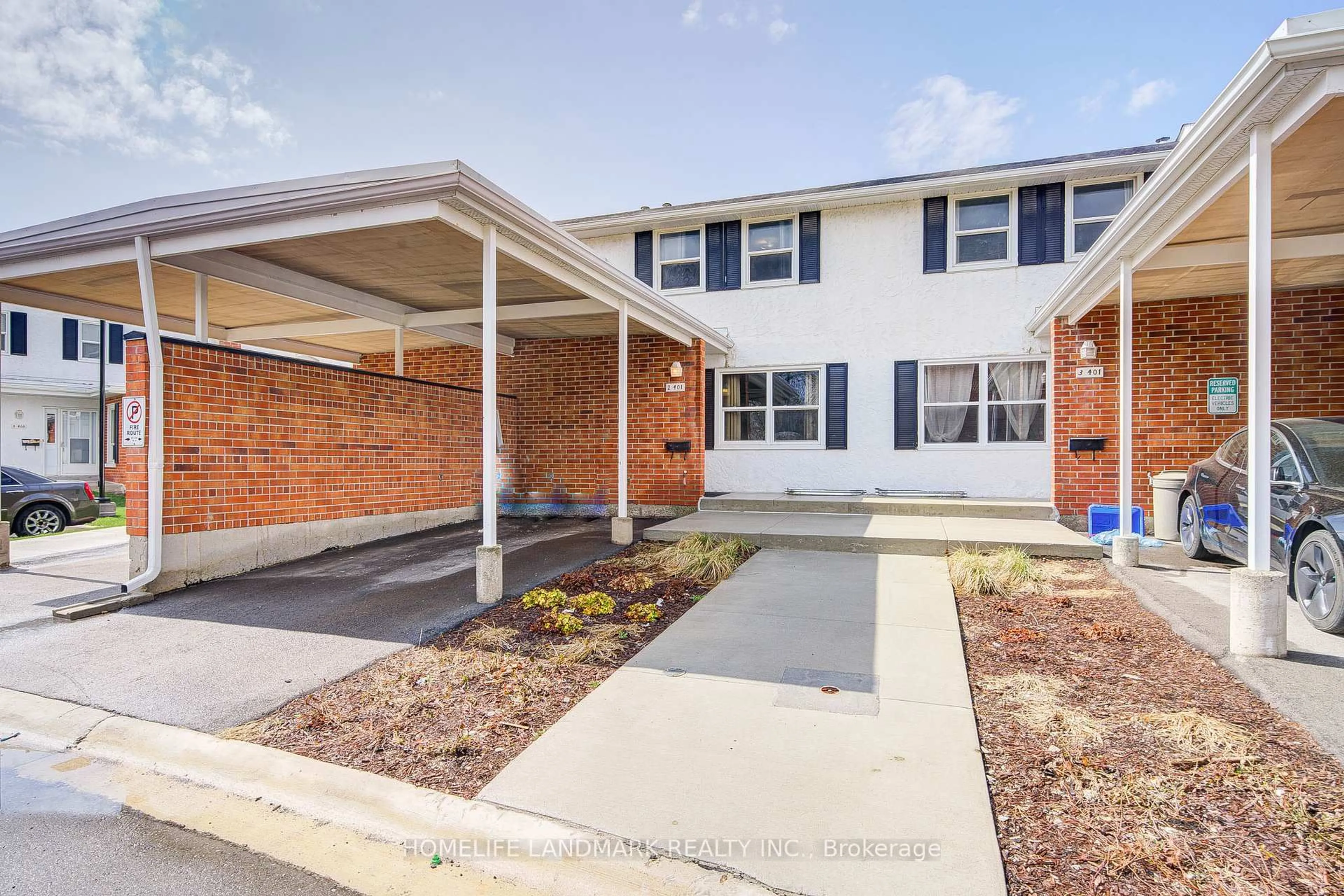 Home with brick exterior material, street for 401 Keats Way #2, Waterloo Ontario N2L 5S7
