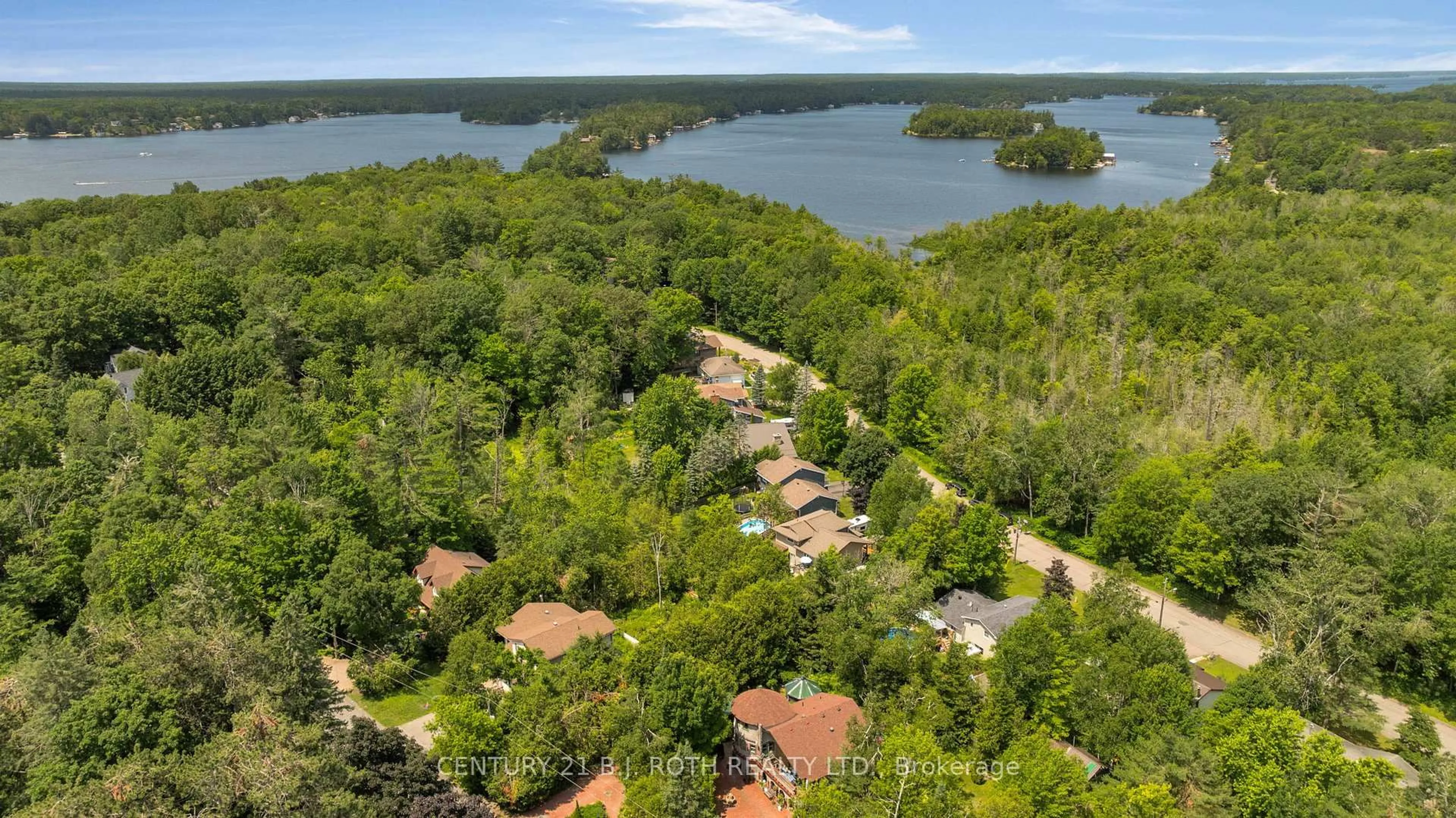 A pic from outside/outdoor area/front of a property/back of a property/a pic from drone, water/lake/river/ocean view for 175 Segwun Blvd, Gravenhurst Ontario P1P 1C5
