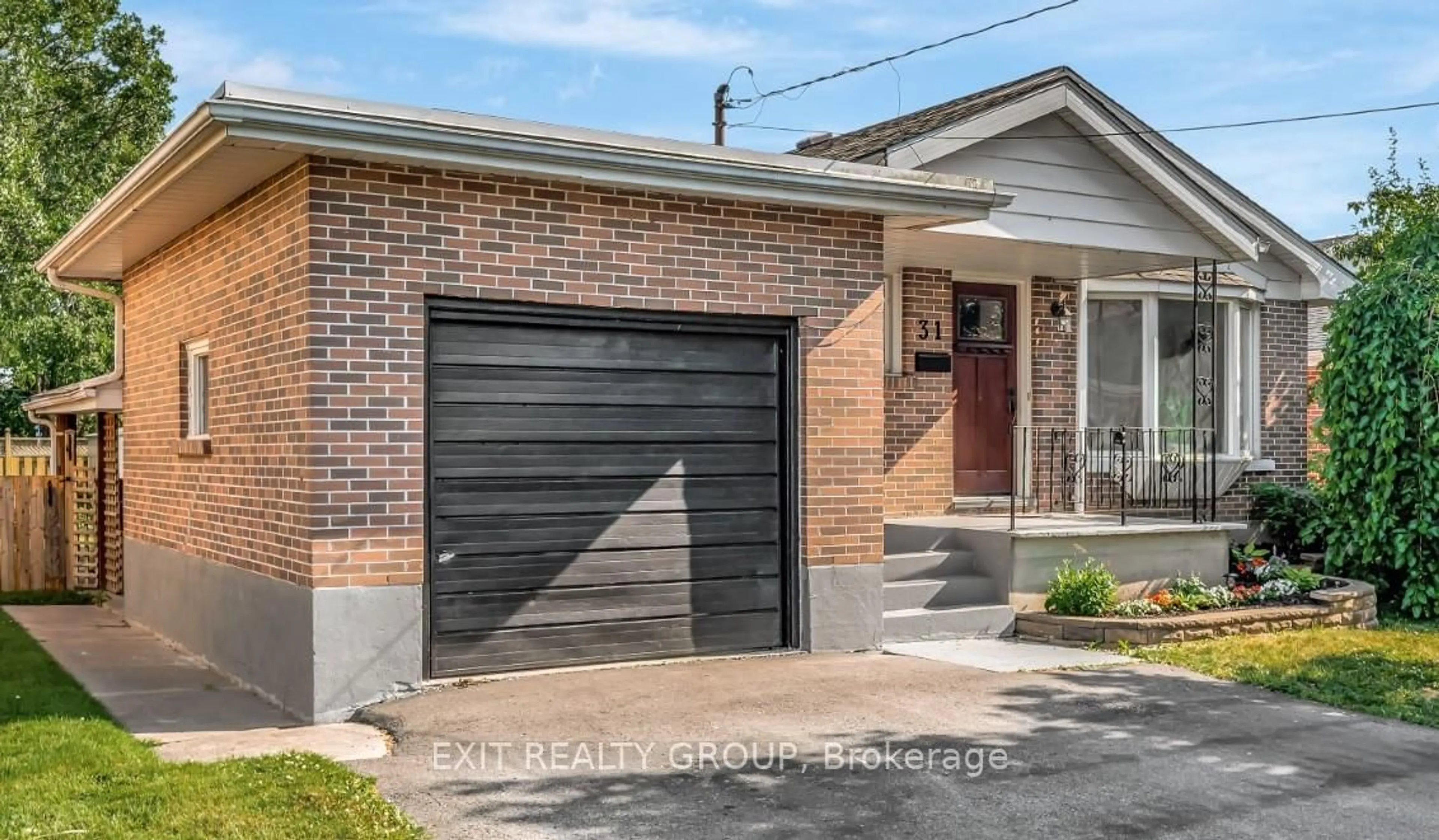 Home with brick exterior material, street for 31 Plaza Sq, Belleville Ontario K8N 4J2