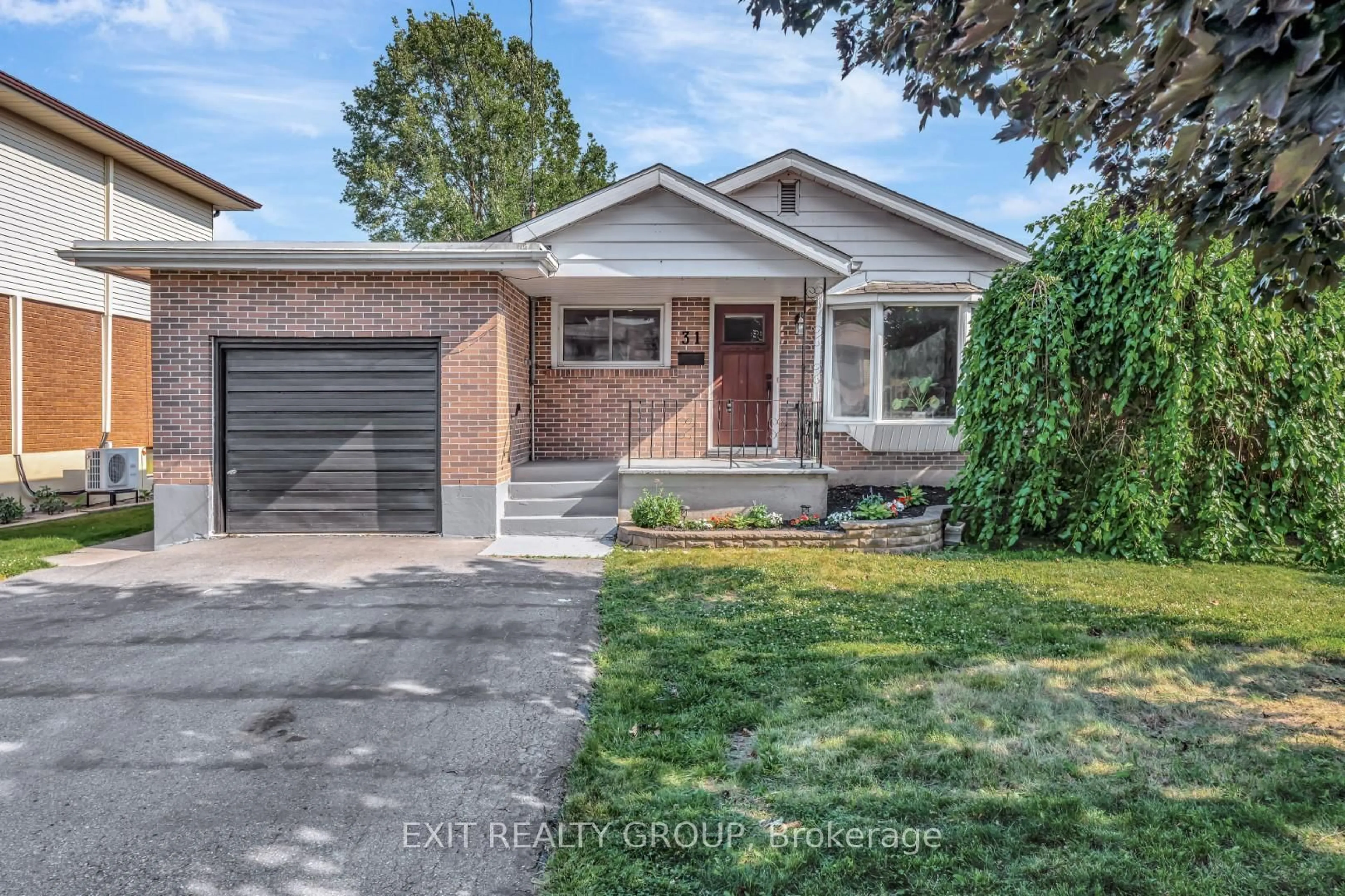 Home with brick exterior material, street for 31 Plaza Sq, Belleville Ontario K8N 4J2