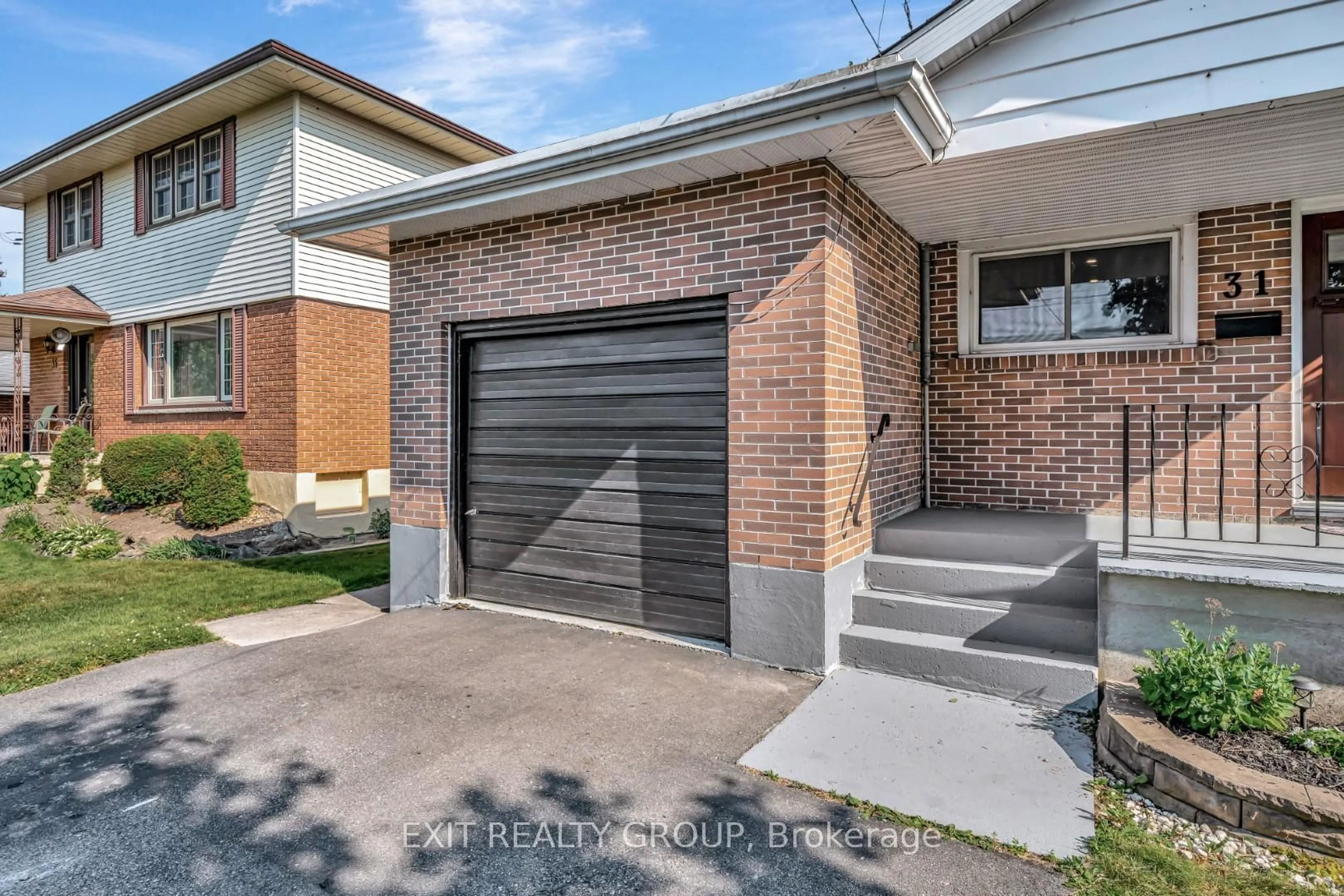 Home with brick exterior material, street for 31 Plaza Sq, Belleville Ontario K8N 4J2