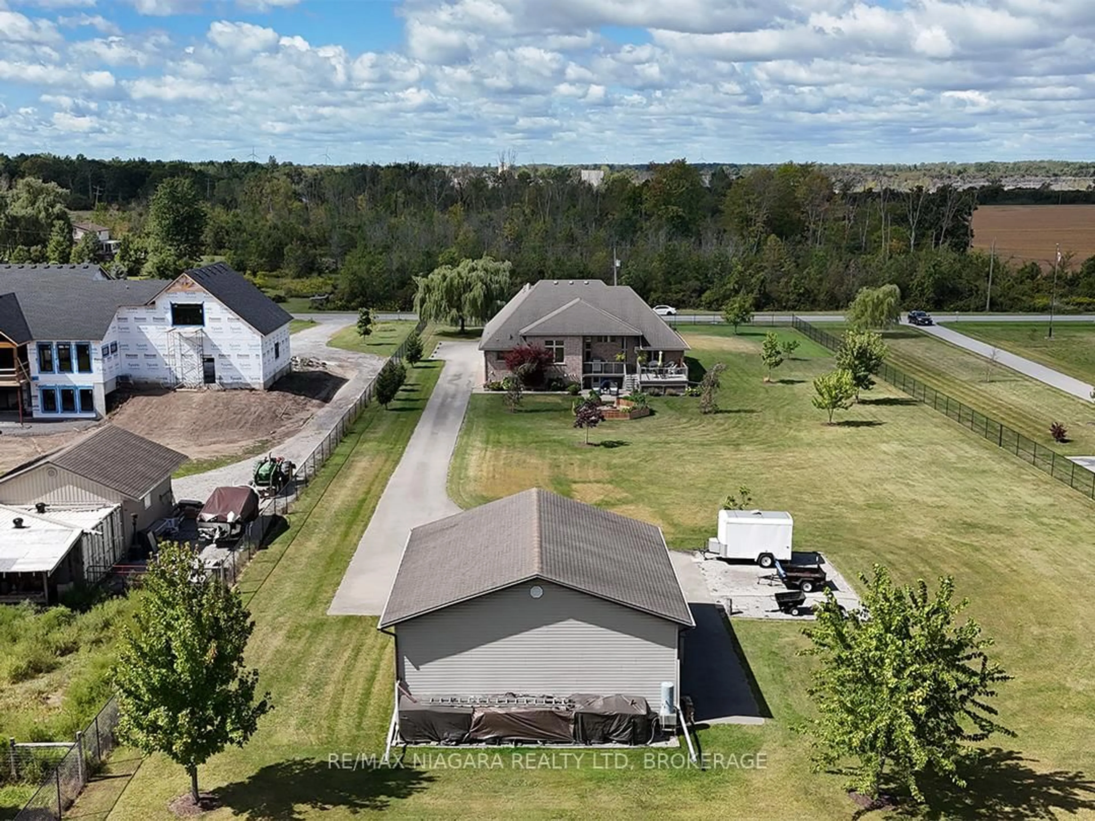 A pic from outside/outdoor area/front of a property/back of a property/a pic from drone, unknown for 20219 Youngs Rd, Wainfleet Ontario L3K 5V4