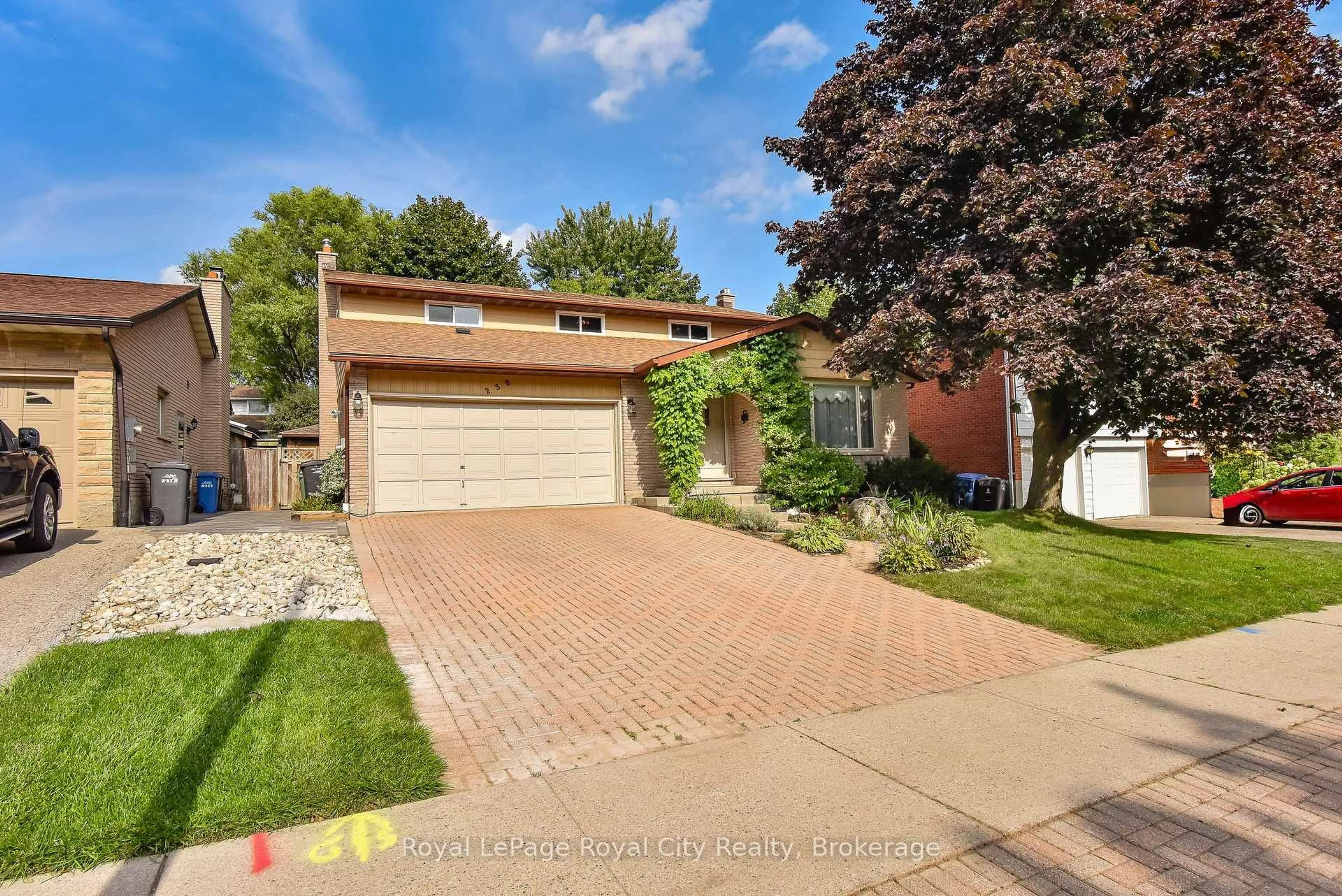 Home with brick exterior material, street for 236 Ironwood Rd, Guelph Ontario N1G 3G1