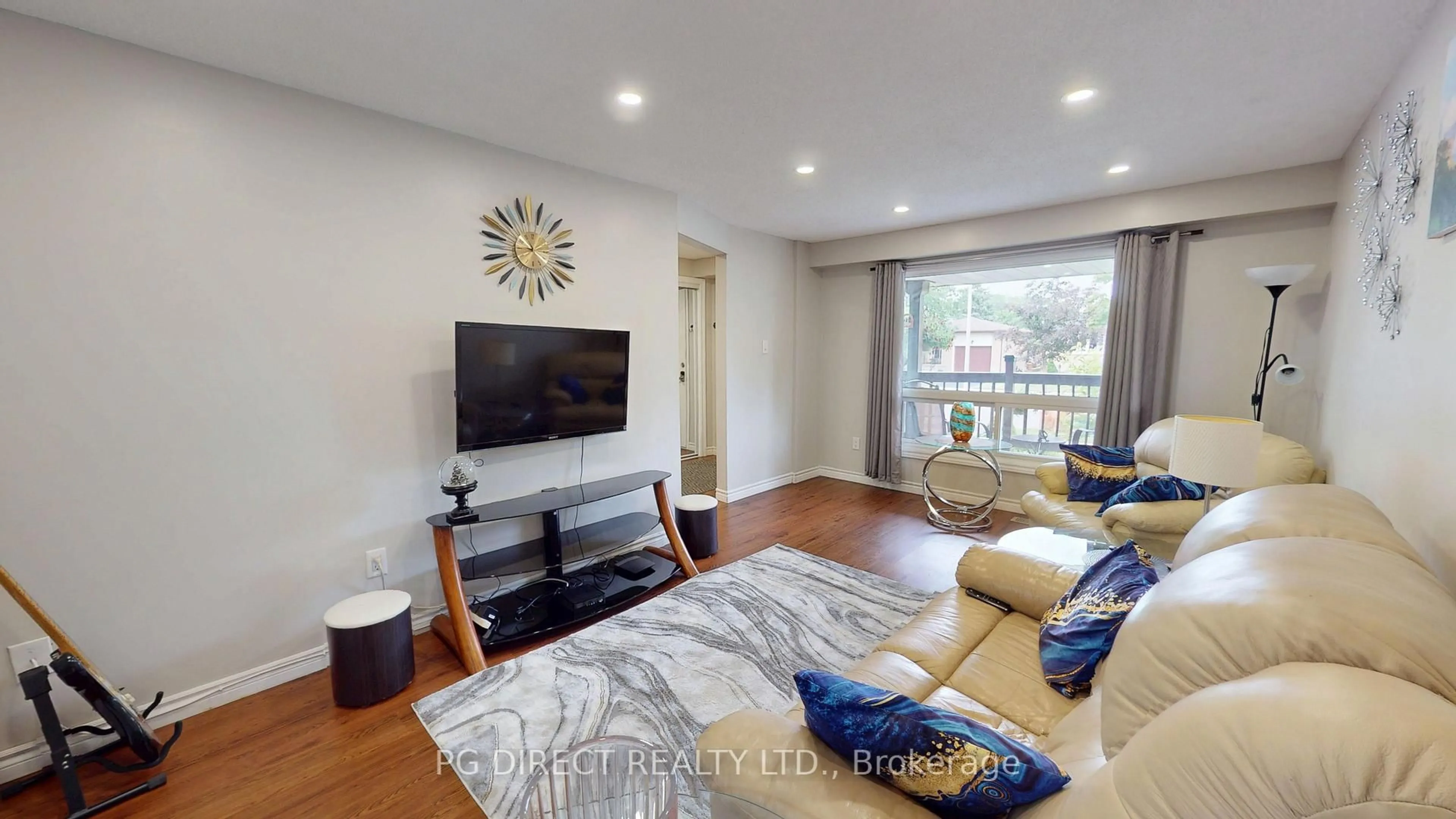 Living room with furniture, wood/laminate floor for 300 Conservation Dr, Waterloo Ontario N2V 1V5