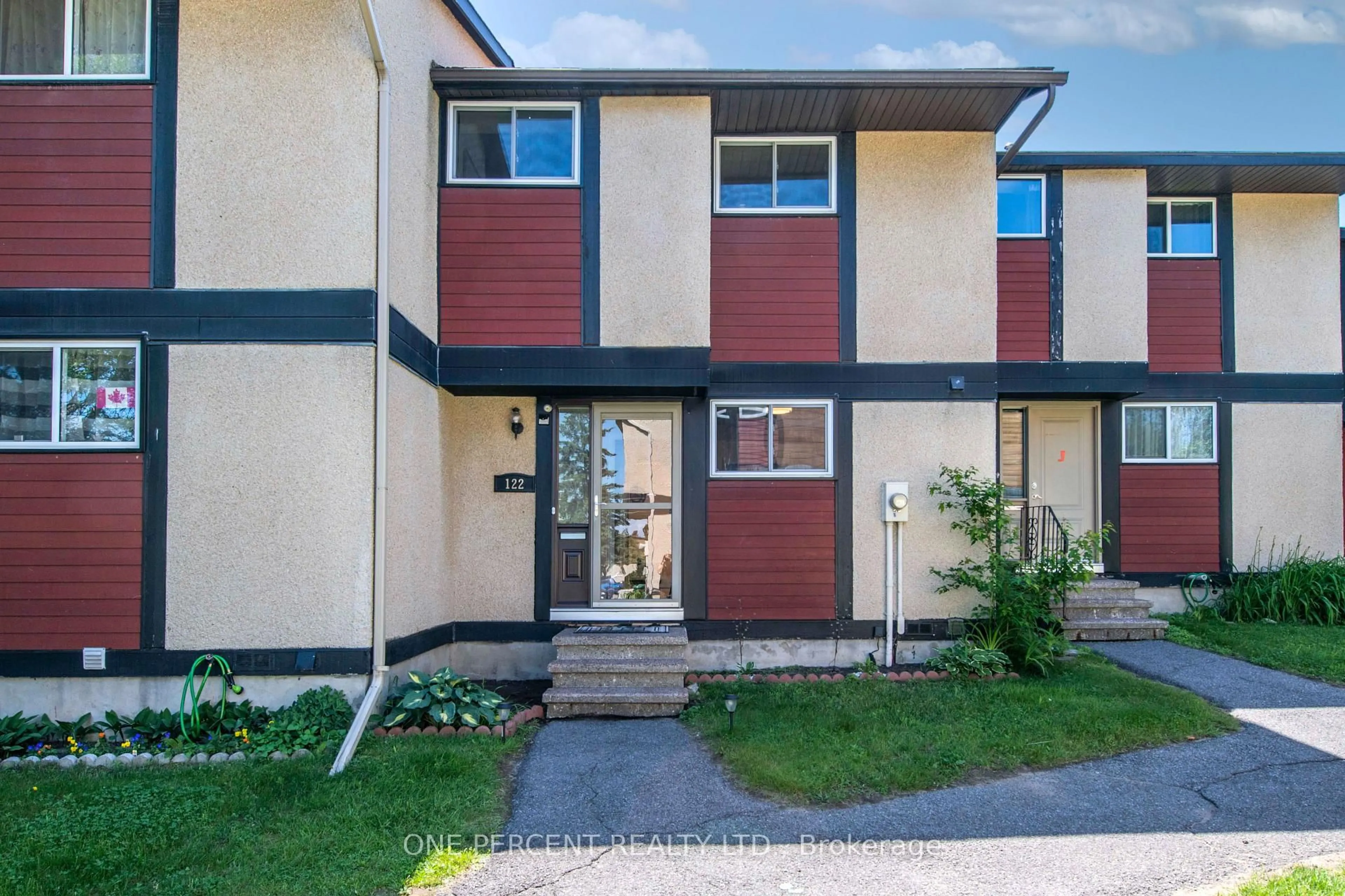 Home with vinyl exterior material, street for 122 McClintock Way, Ottawa Ontario K2L 2A4