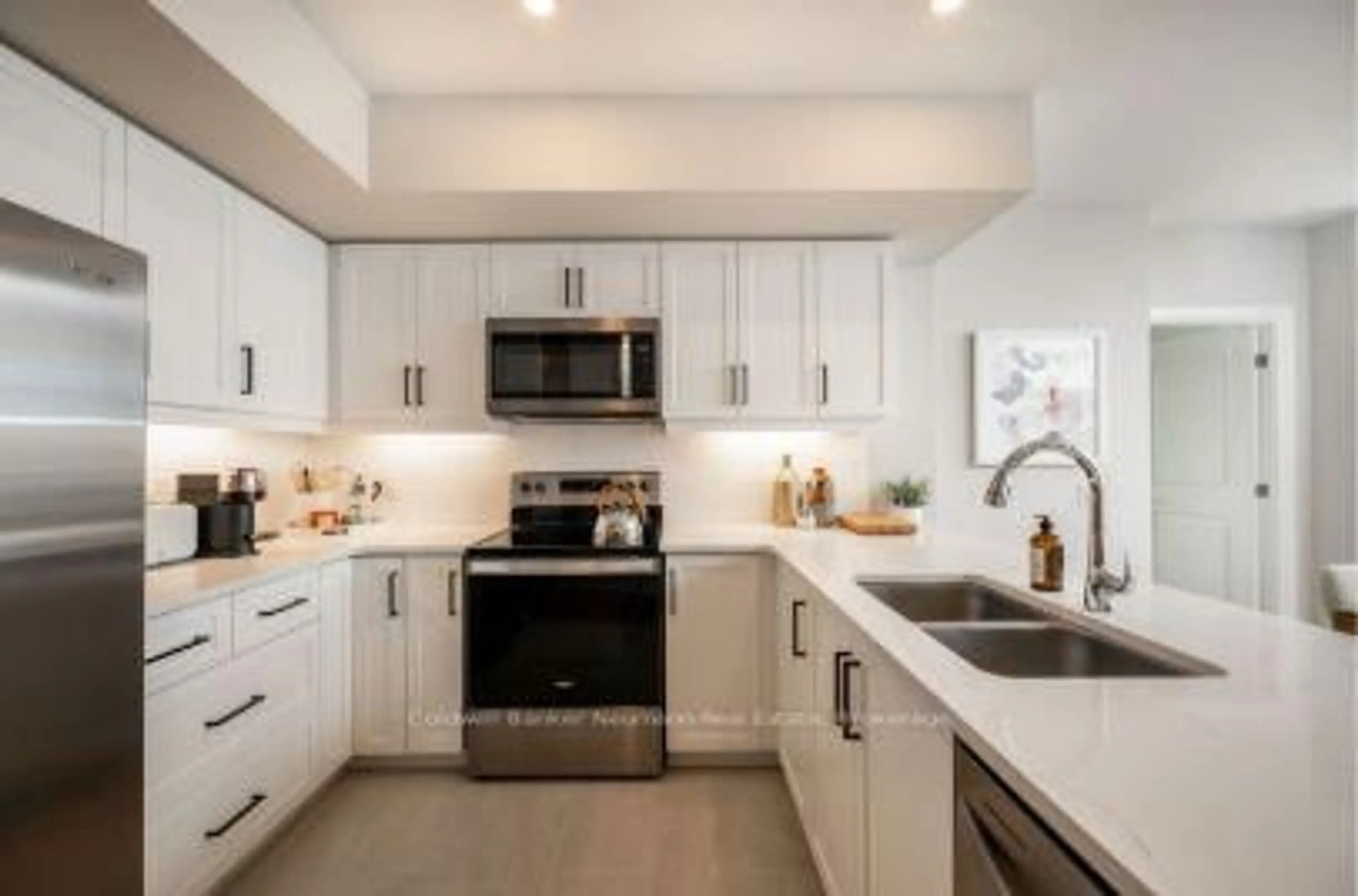 Contemporary kitchen, ceramic/tile floor for 1882 Gordon St #224, Guelph Ontario N1L 0P6