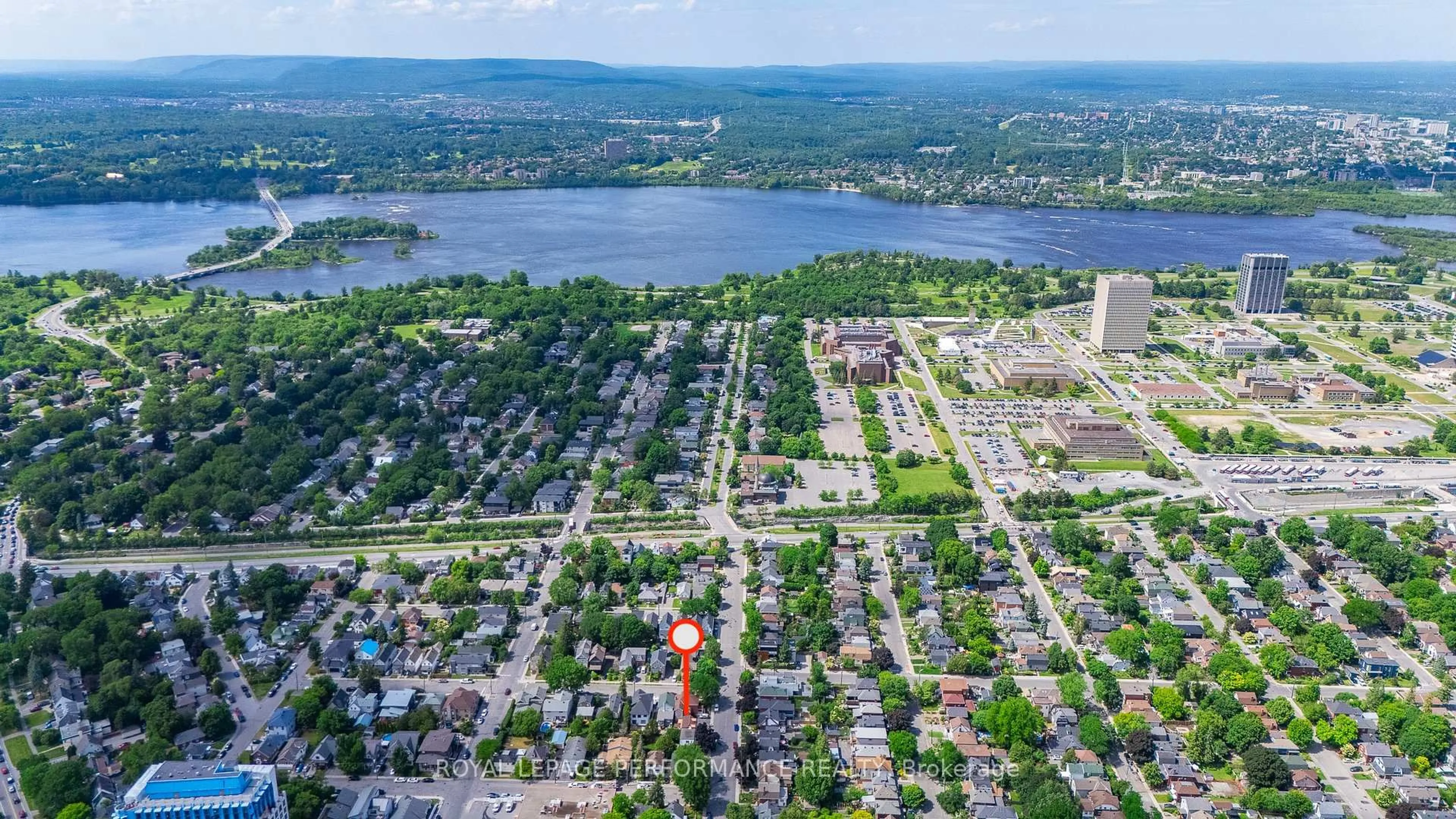 A pic from outside/outdoor area/front of a property/back of a property/a pic from drone, water/lake/river/ocean view for 58 Western Ave, Ottawa Ontario K1Y 0L7