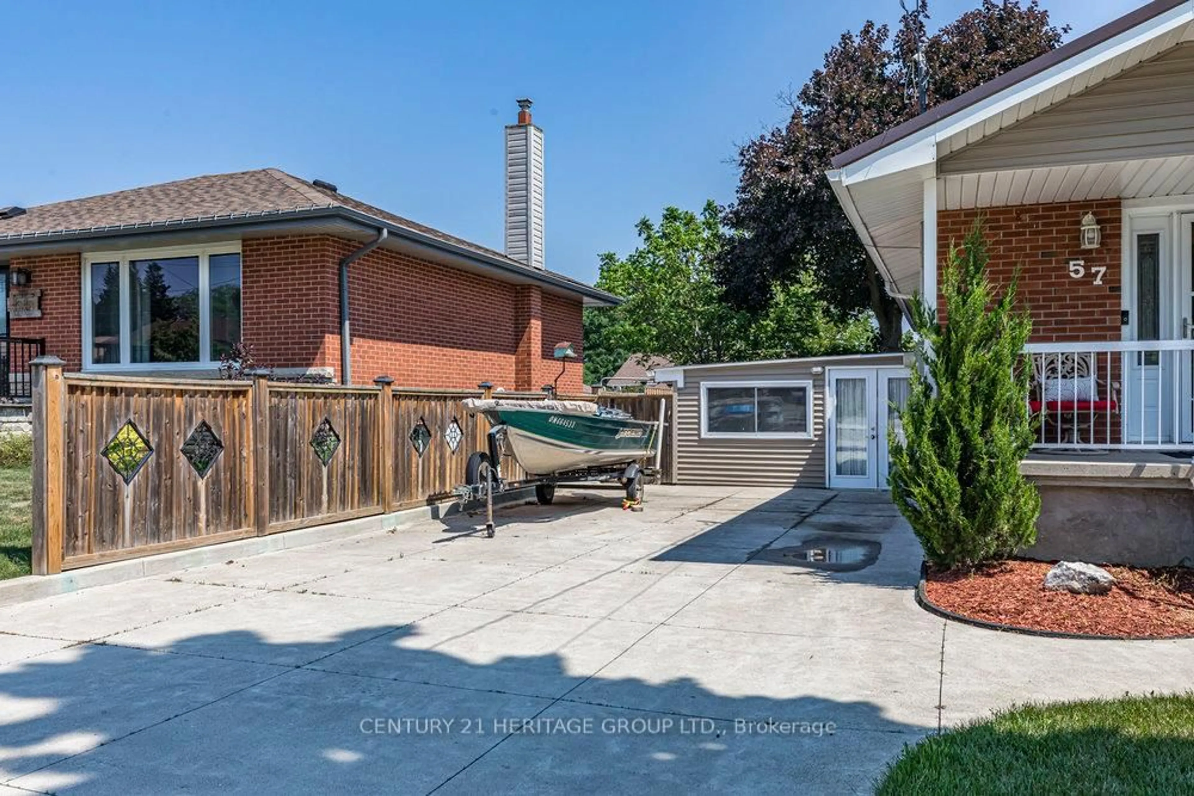 Patio, street for 57 Burfield Ave, Hamilton Ontario L8T 2J8