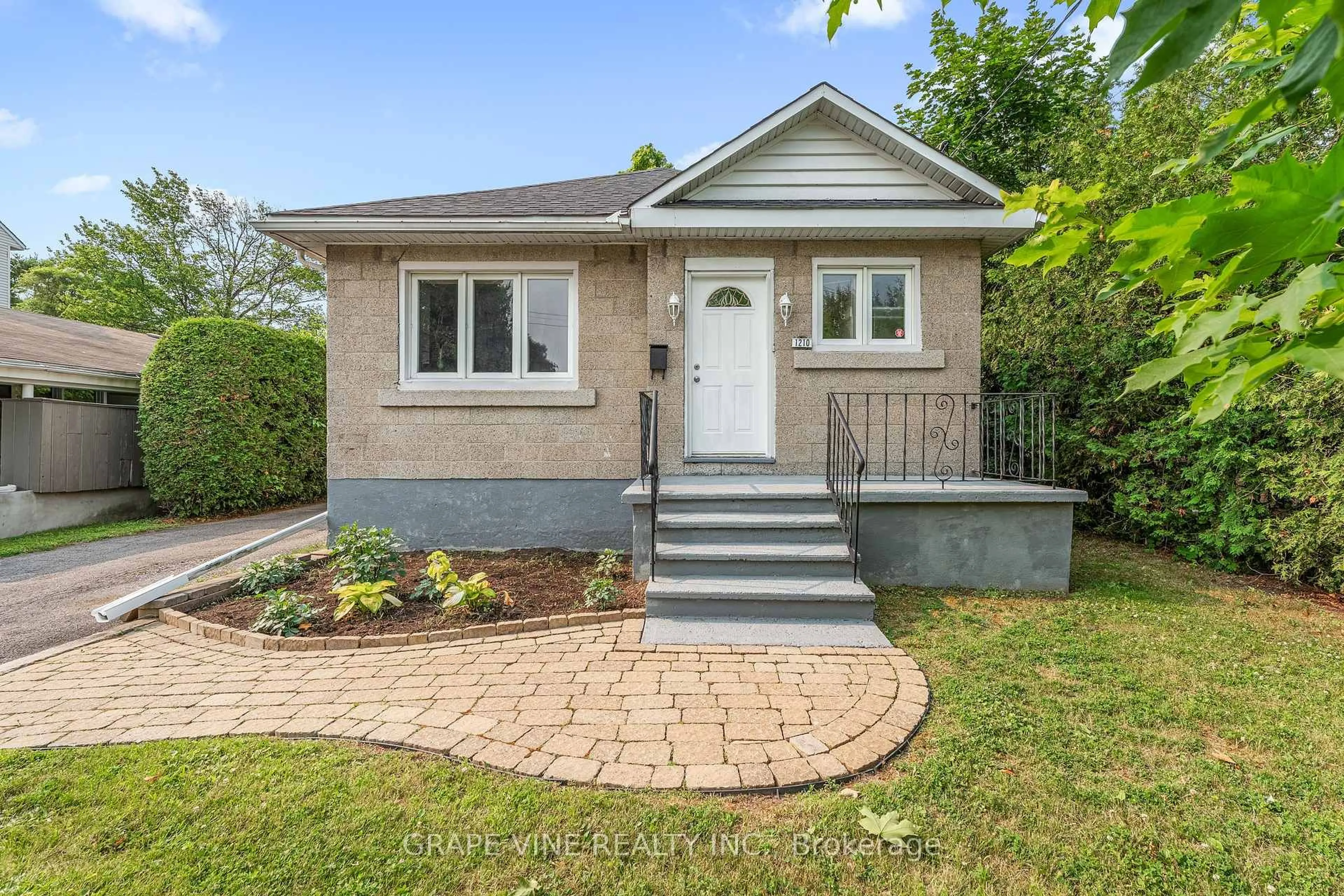 Home with brick exterior material, street for 1210 Erie Ave, Ottawa Ontario K1V 6G6