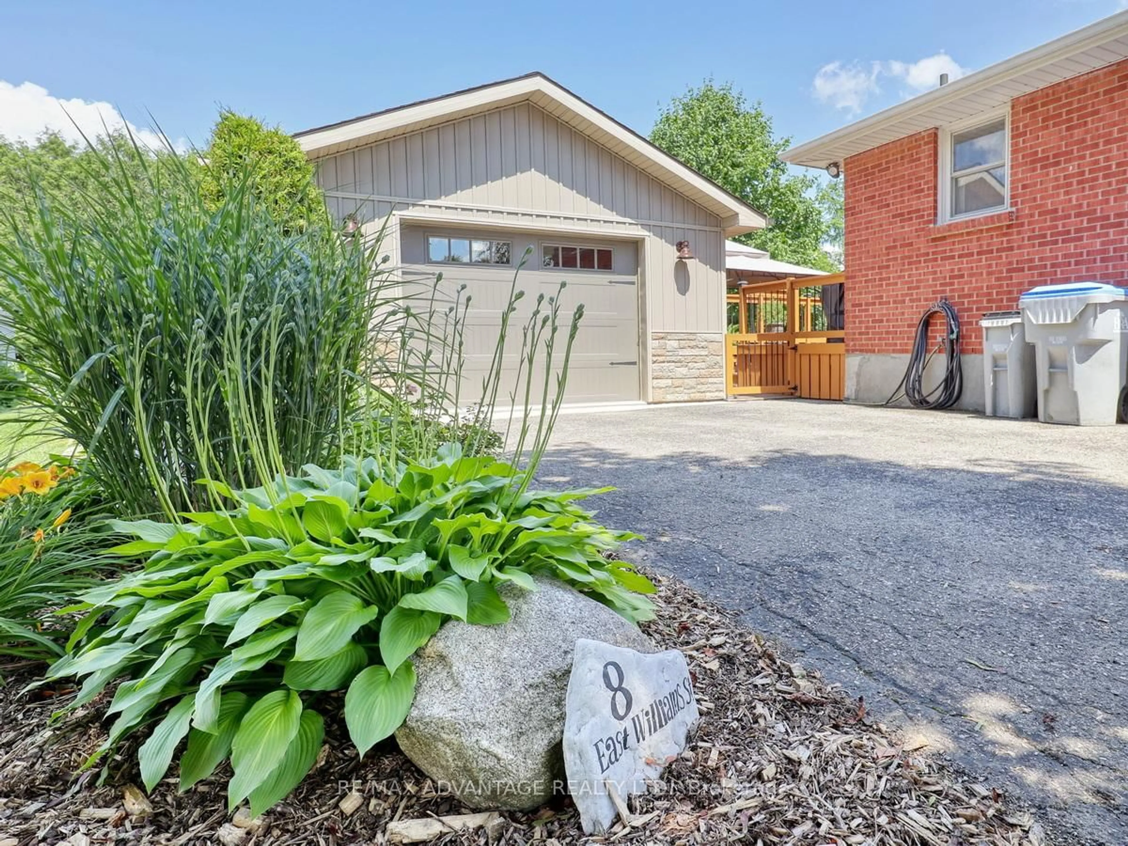 Home with brick exterior material, street for 8 East Williams St, North Middlesex Ontario N0M 1A0