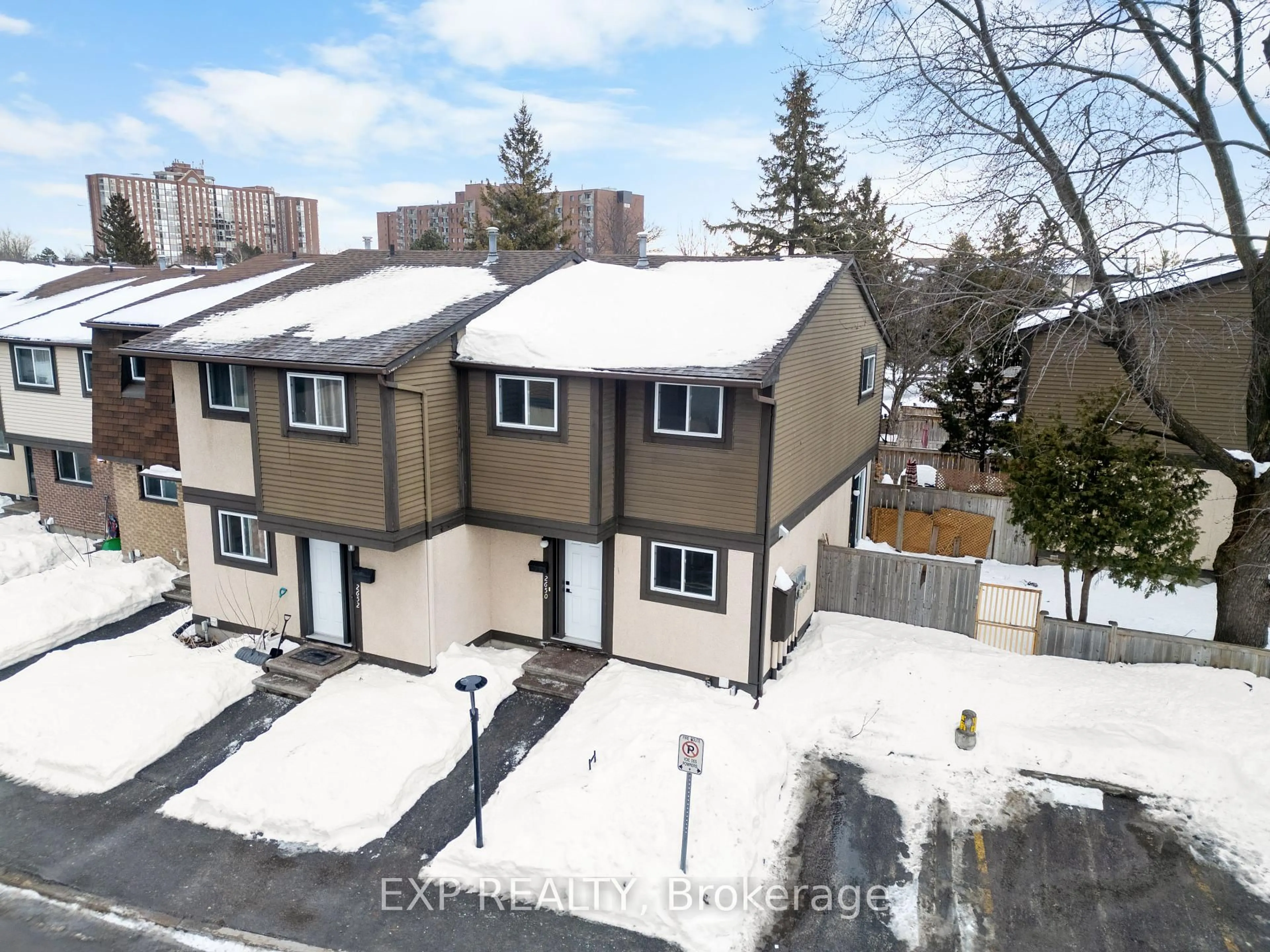 A pic from outside/outdoor area/front of a property/back of a property/a pic from drone, street for 2650 Pimlico Cres #107, Ottawa Ontario K1T 2A8
