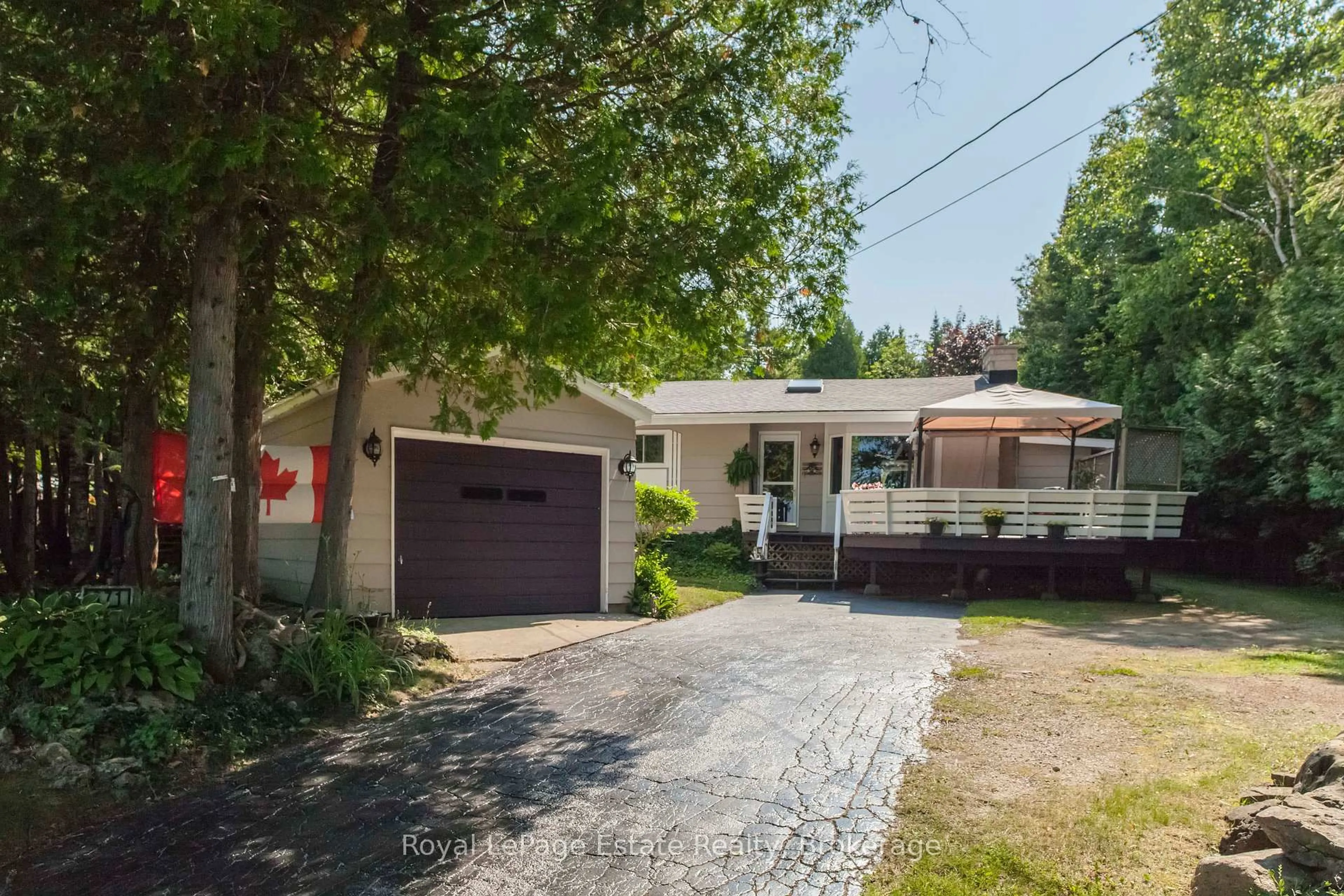 A pic from outside/outdoor area/front of a property/back of a property/a pic from drone, street for 371 Bay St, South Bruce Peninsula Ontario N0H 2T0