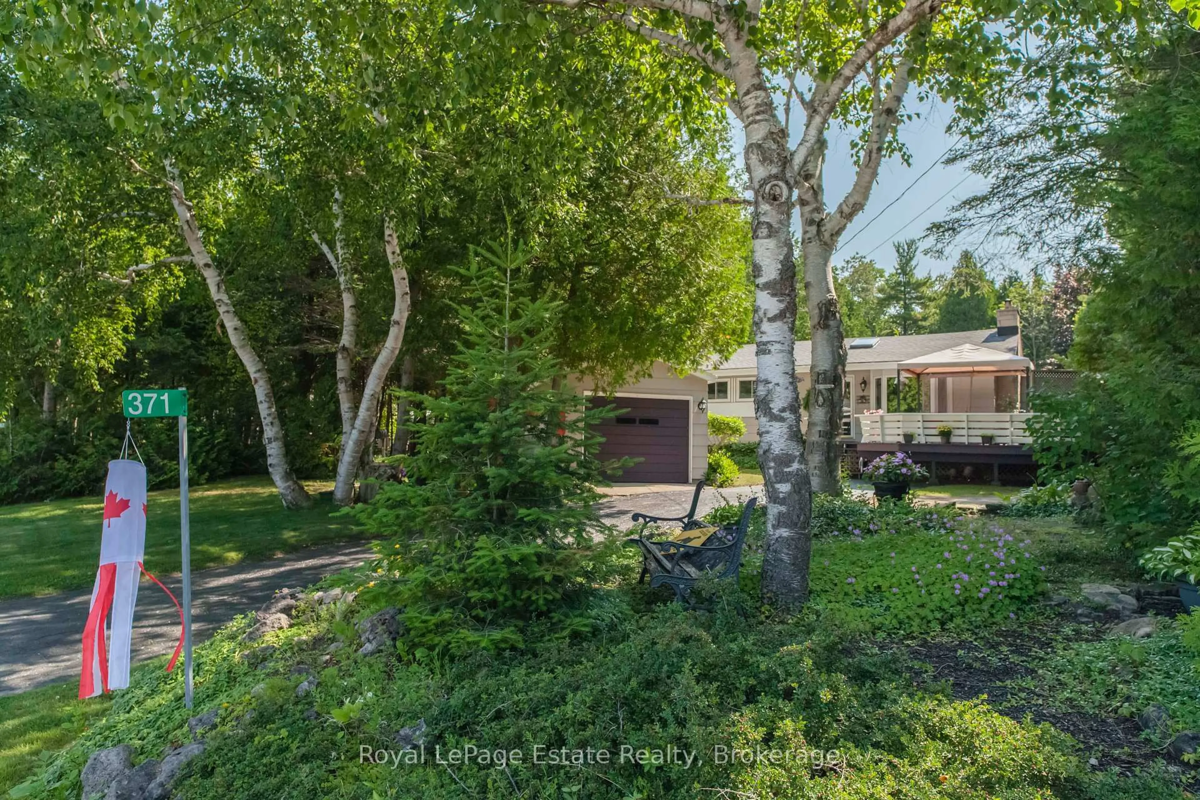 A pic from outside/outdoor area/front of a property/back of a property/a pic from drone, forest/trees view for 371 Bay St, South Bruce Peninsula Ontario N0H 2T0