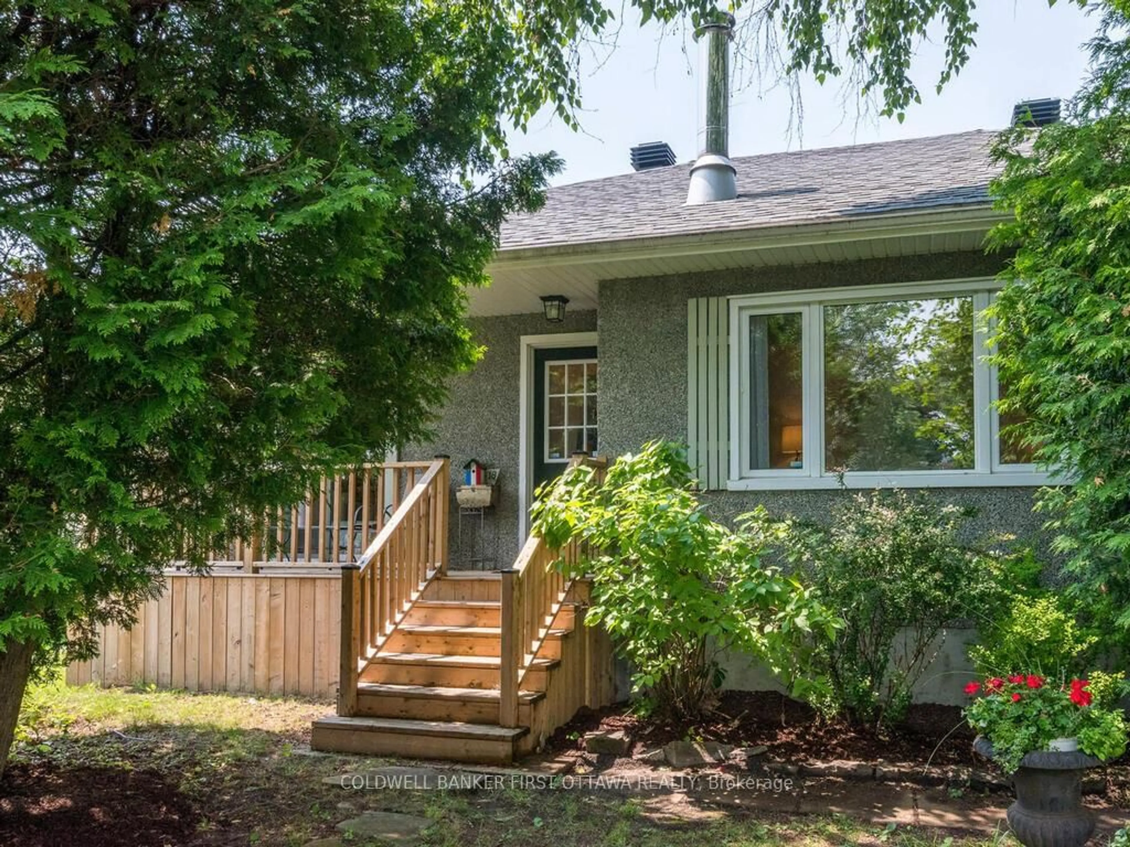 Home with vinyl exterior material, street for 18 Sutton Pl, Ottawa Ontario K2E 5G3